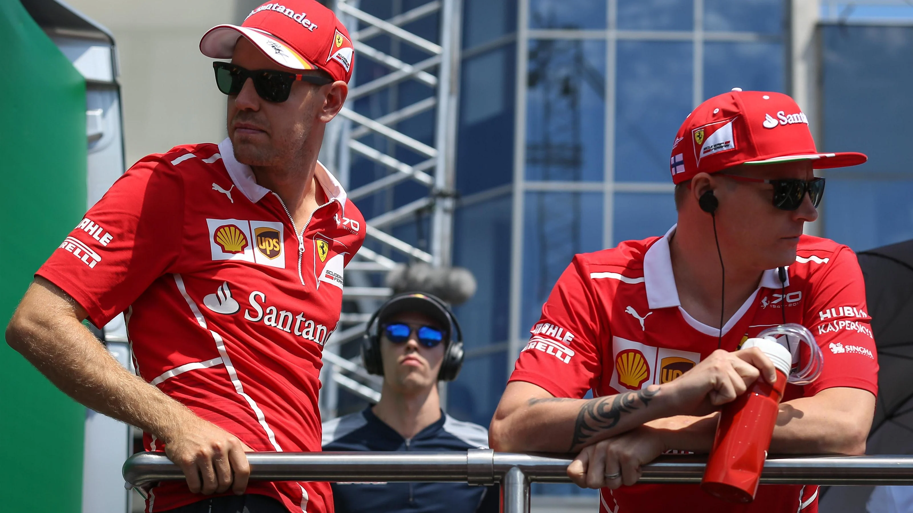 Sebastian Vettel (GER) Ferrari and Kimi Raikkonen (FIN) Ferrari on the drivers parade at Formula