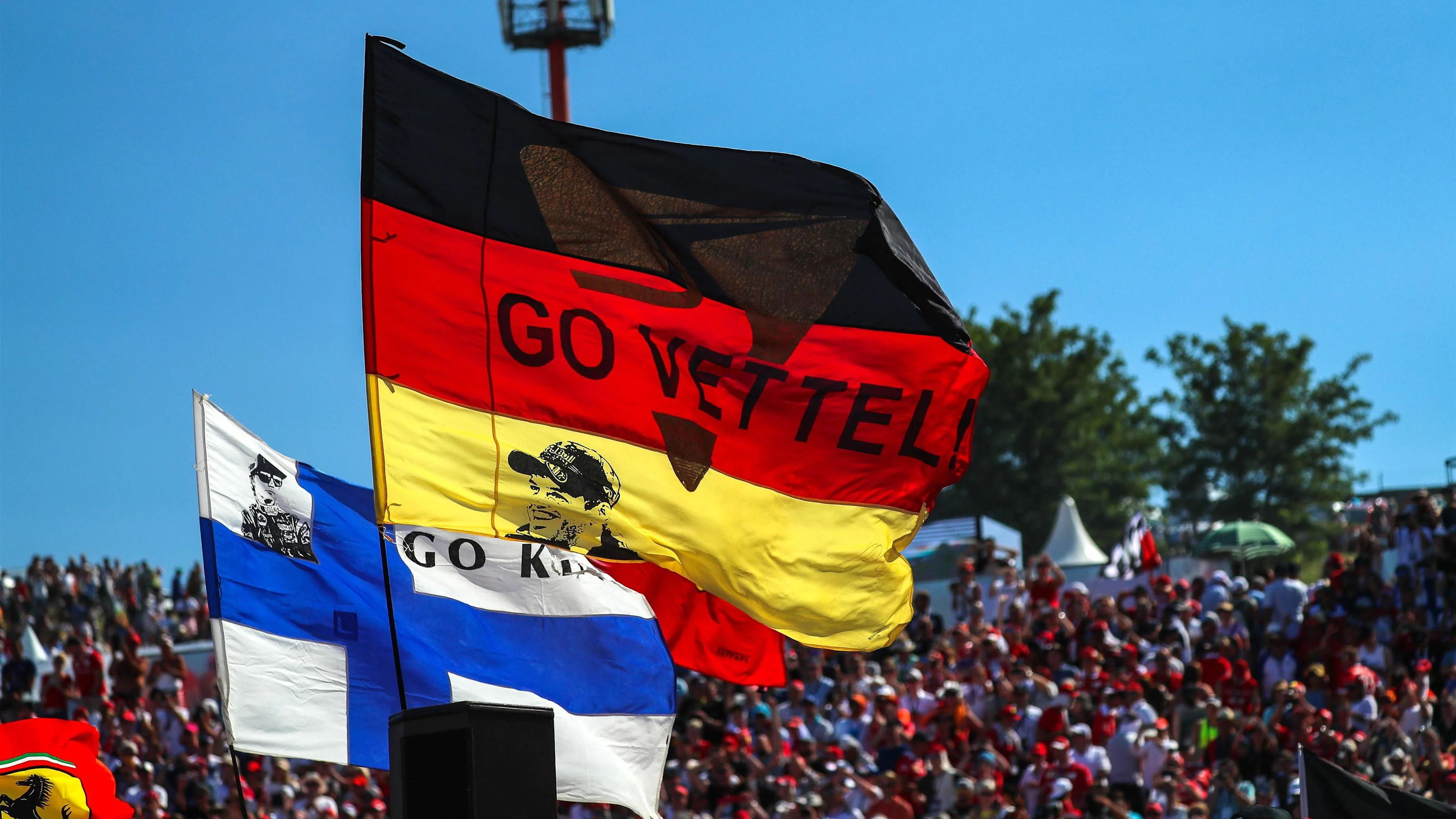 'Go Vettel' fan flag for Sebastian Vettel (GER) Ferrari at Formula One World Championship, Rd11,