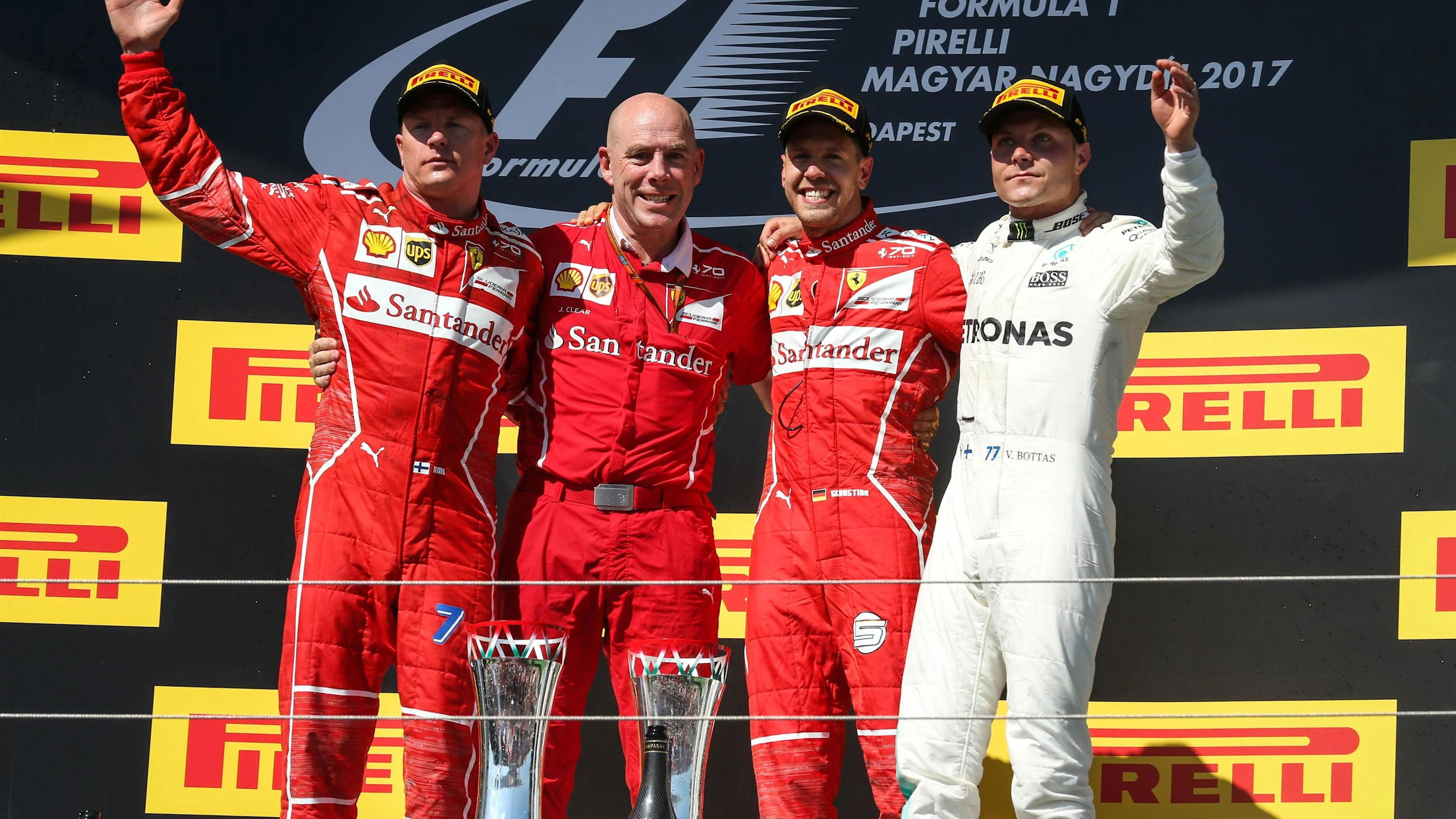 Podium: (L to R): Kimi Raikkonen (FIN) Ferrari, Jock Clear (GBR) Ferrari Chief Engineer, race