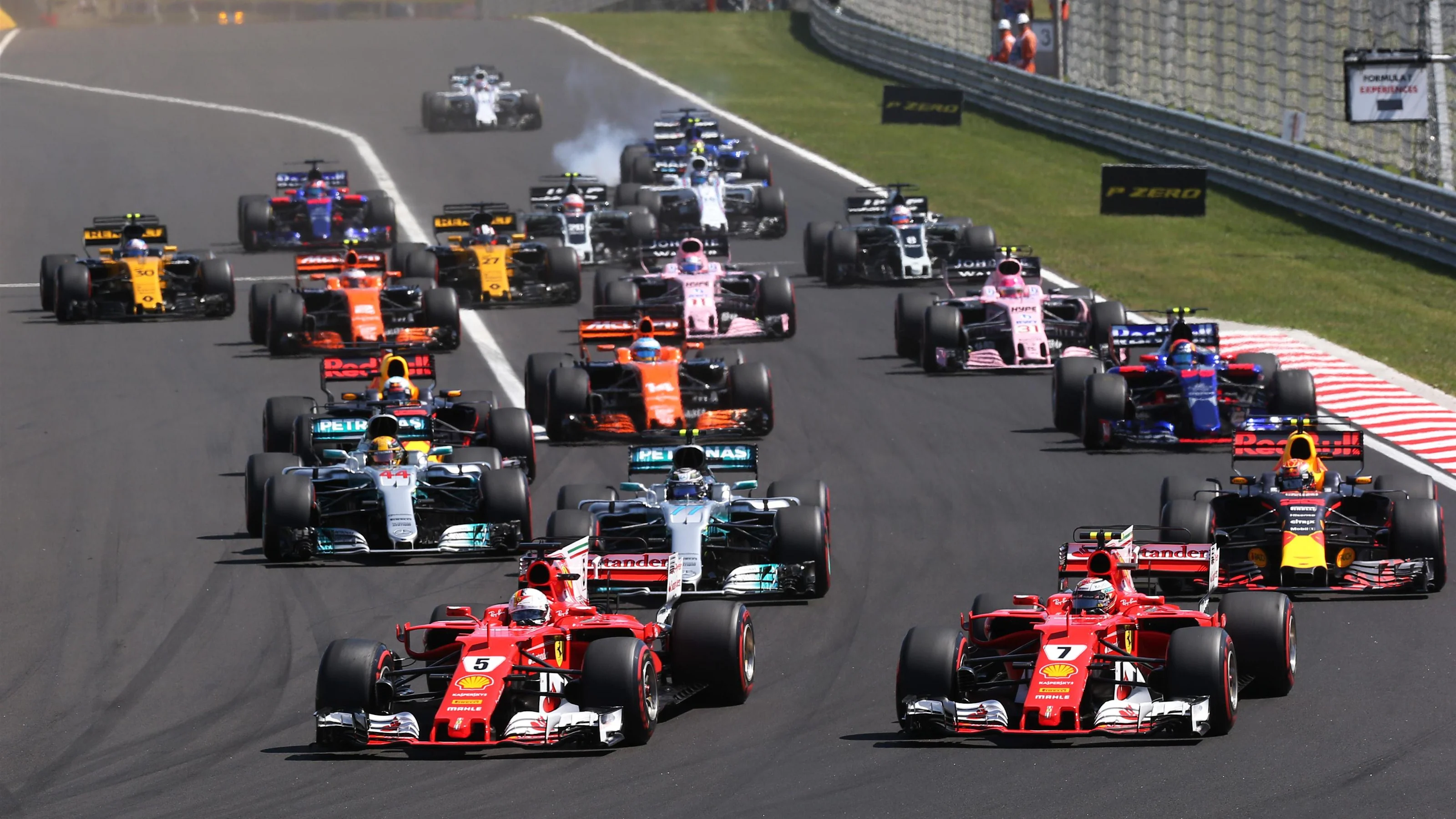 Sebastian Vettel (GER) Ferrari SF70-H leads at the start of the race at Formula One World
