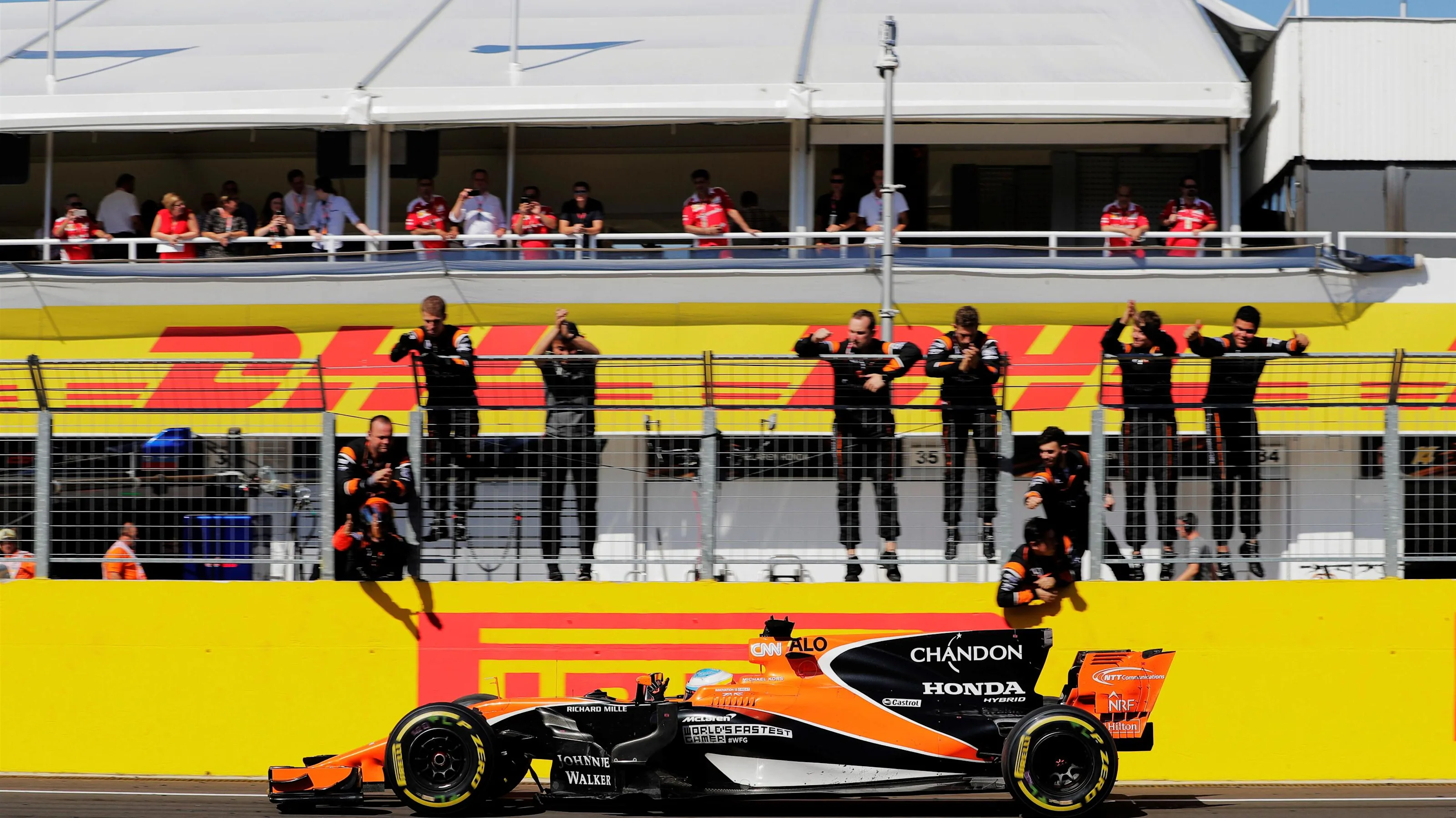 Fernando Alonso (ESP) McLaren MCL32 crosses the line for 6th place at Formula One World