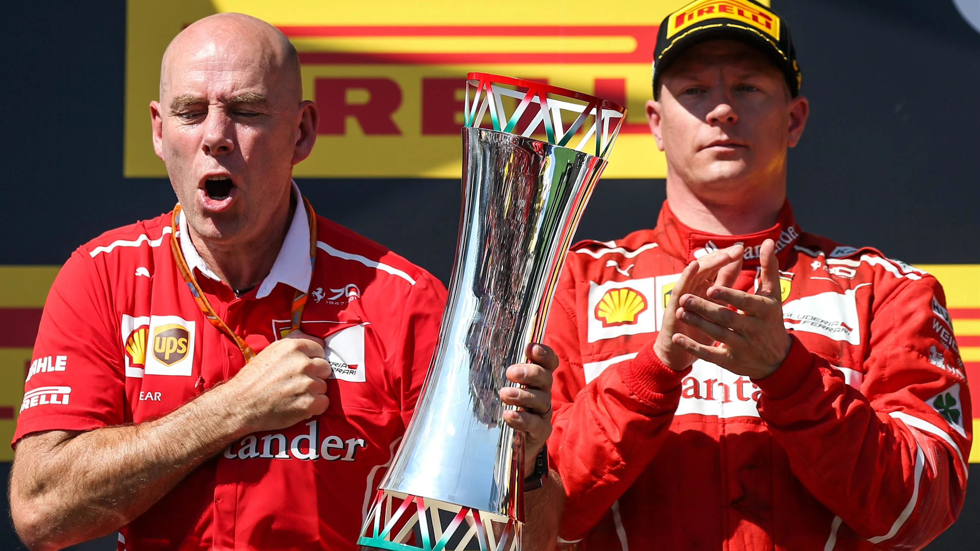 Jock Clear (GBR) Ferrari Chief Engineer and Kimi Raikkonen (FIN) Ferrari celebrate on the podium at