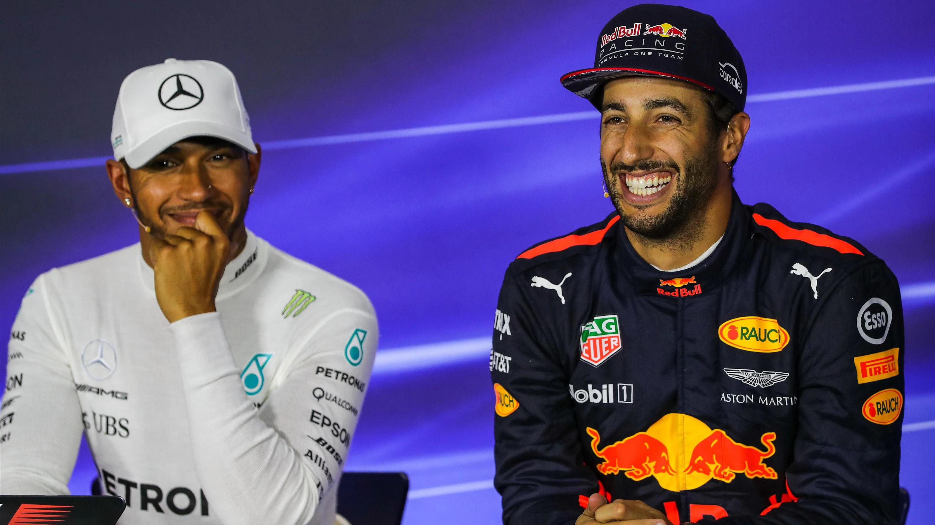 Daniel Ricciardo (AUS) Red Bull Racing and pole sitter Lewis Hamilton (GBR) Mercedes AMG F1 in the