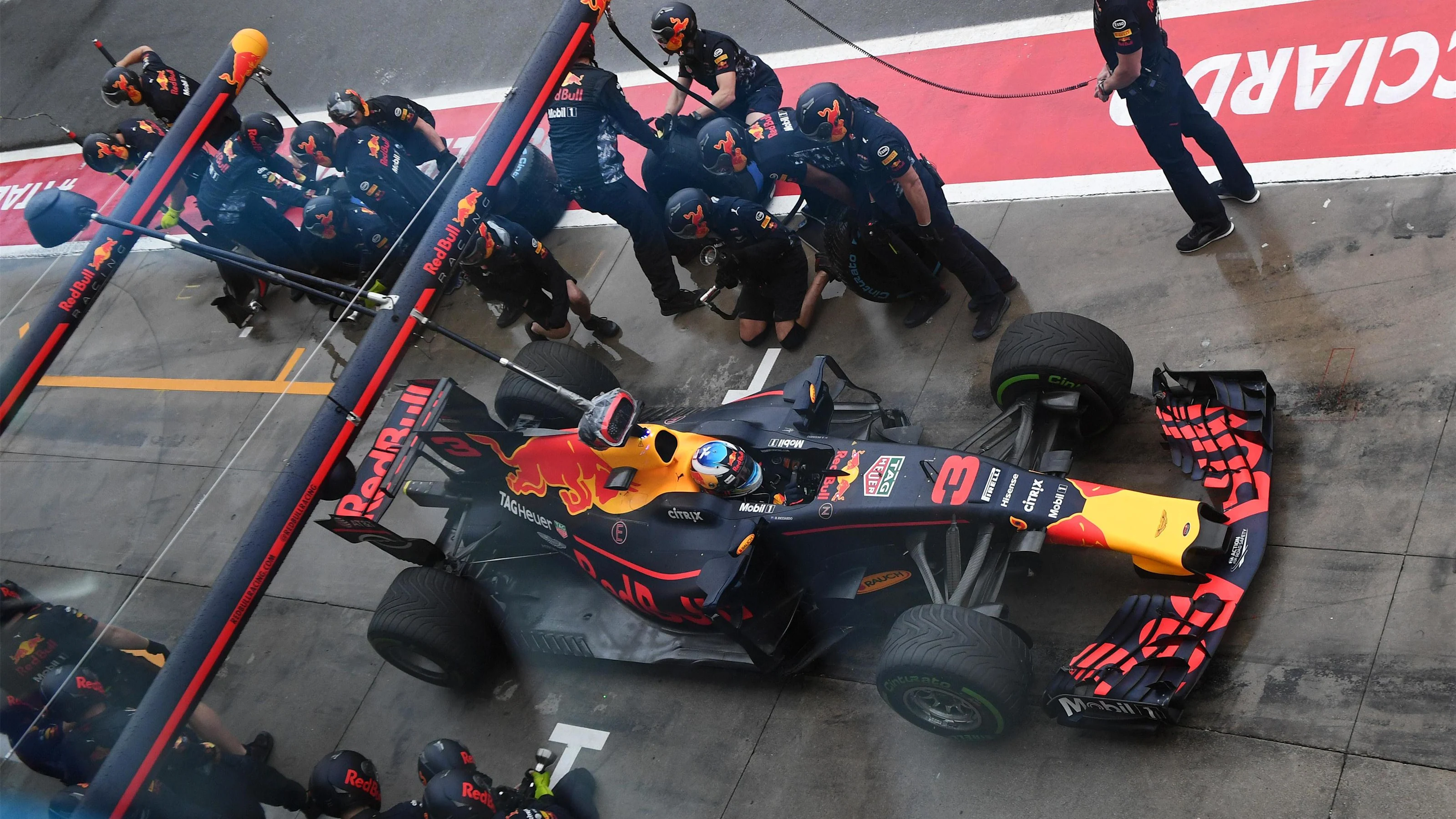 Daniel Ricciardo (AUS) Red Bull Racing RB13 pit stop at Formula One World Championship, Rd13,