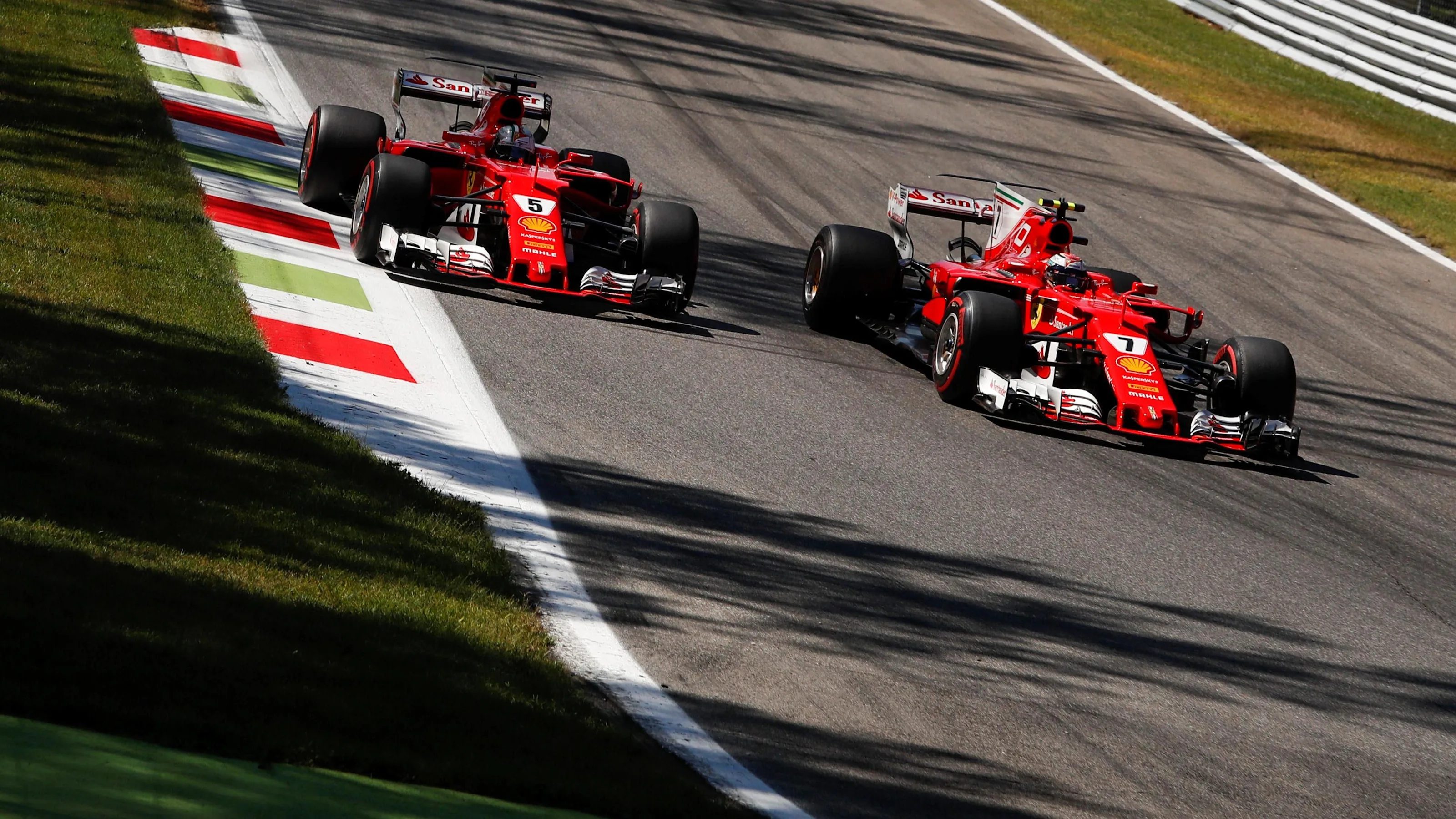 Sebastian Vettel (GER) Ferrari SF70-H and Kimi Raikkonen (FIN) Ferrari SF70-H battle at Formula One