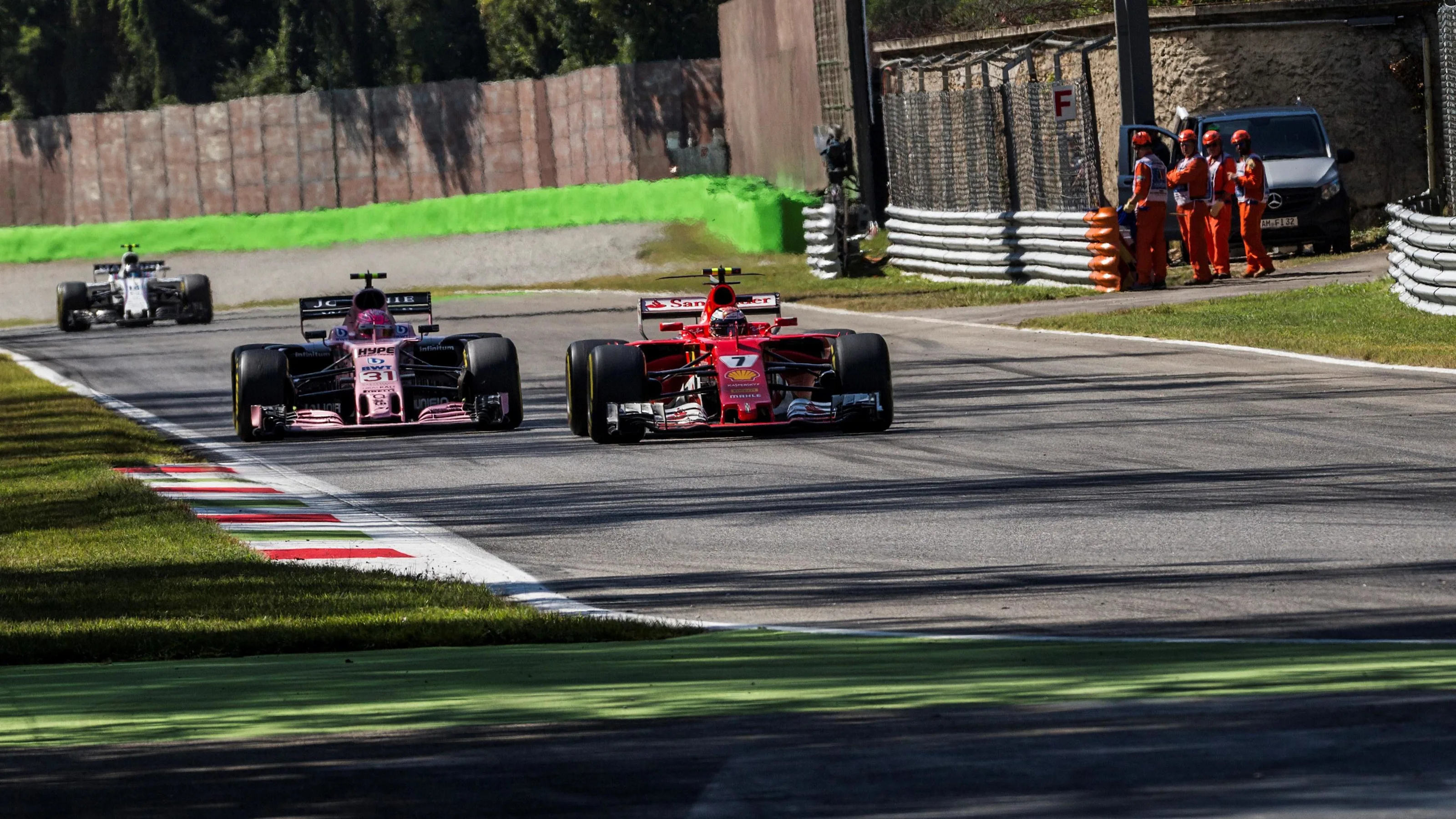 Kimi Raikkonen (FIN) Ferrari SF70-H and Esteban Ocon (FRA) Force India VJM10 battle at Formula One