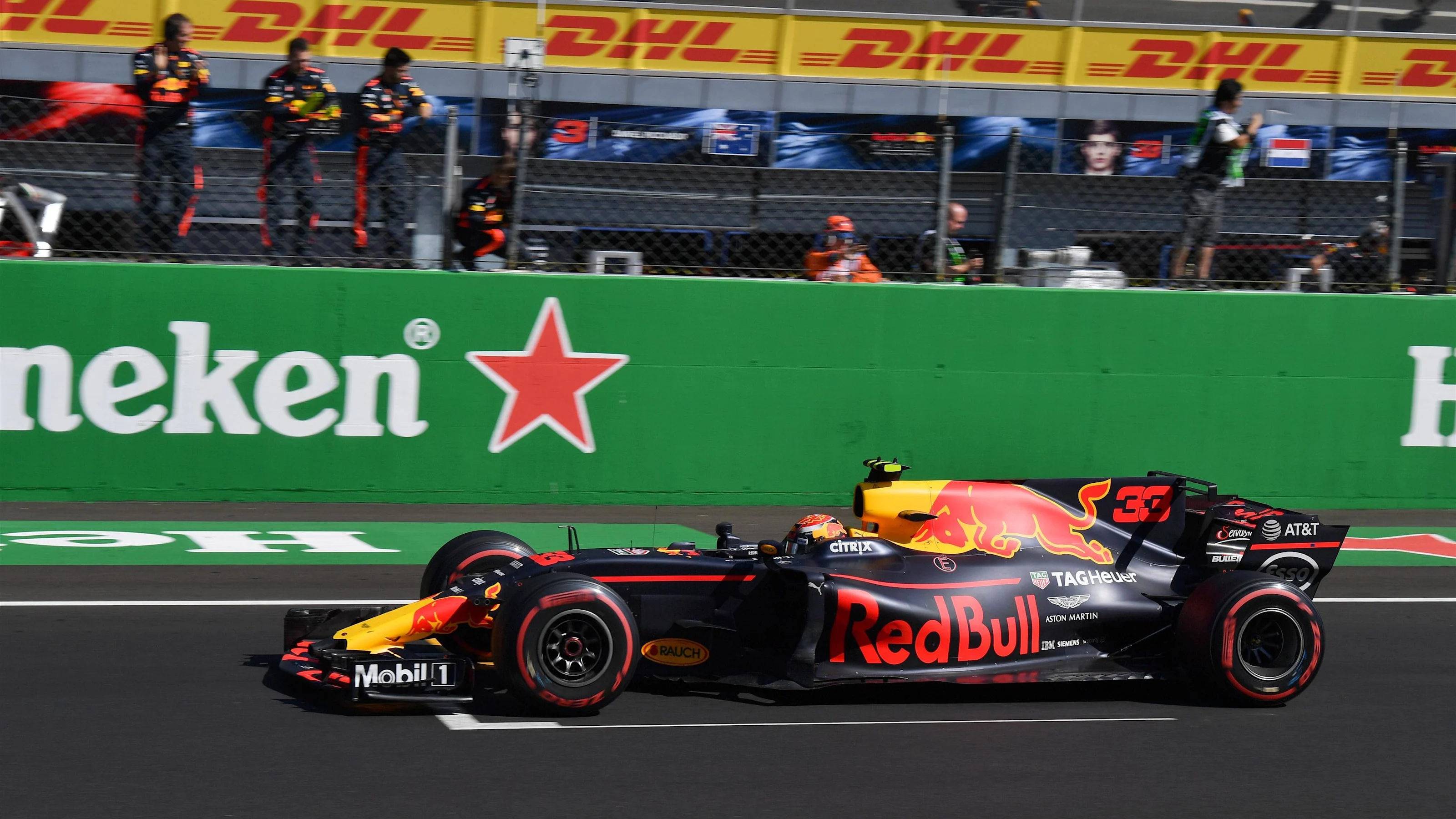 Daniel Ricciardo (AUS) Red Bull Racing RB13 celebrates as he crosses the line for fourth at Formula