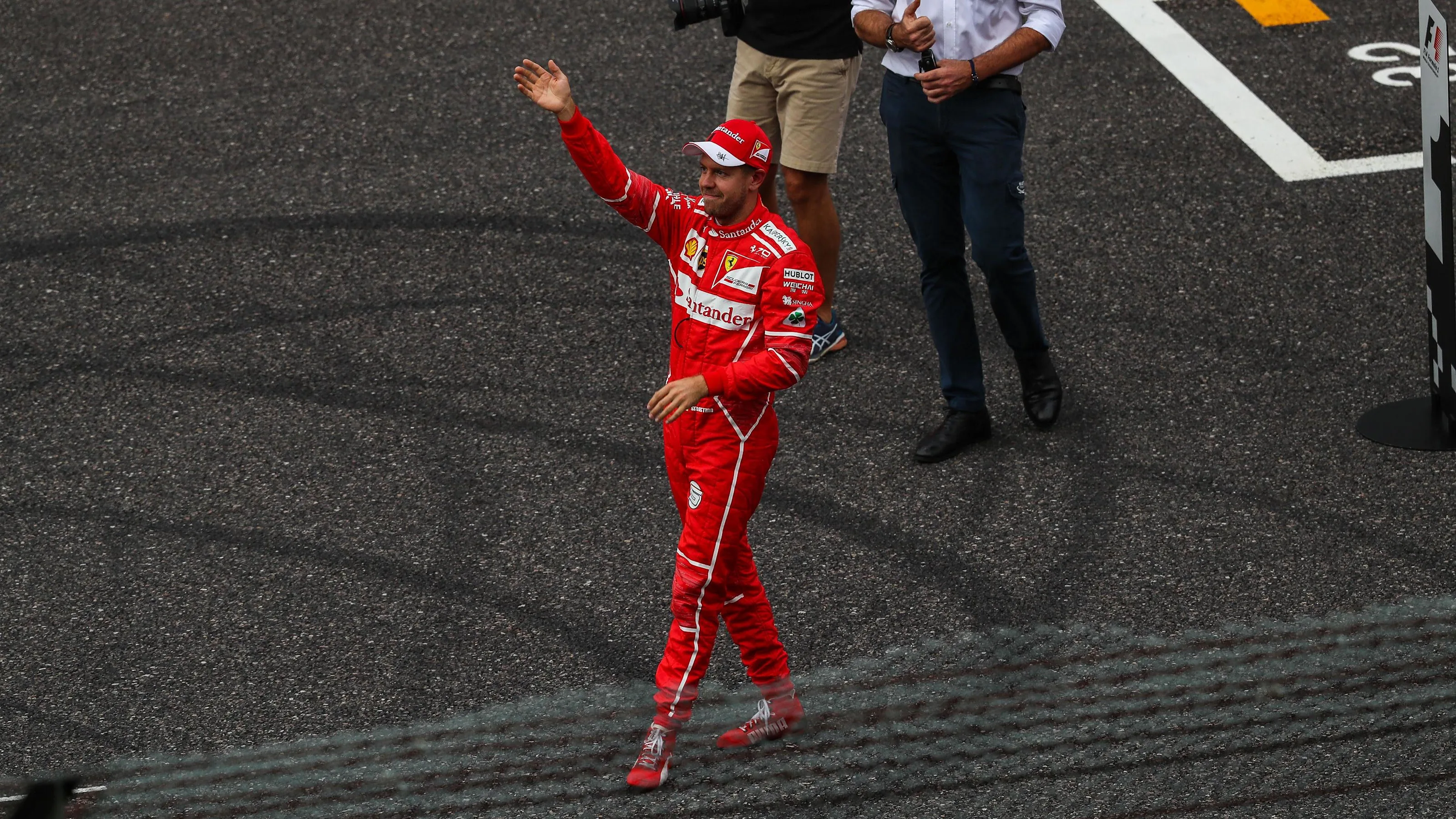 Sebastian Vettel (GER) Ferrari celebrates in parc ferme at Formula One World Championship, Rd16,