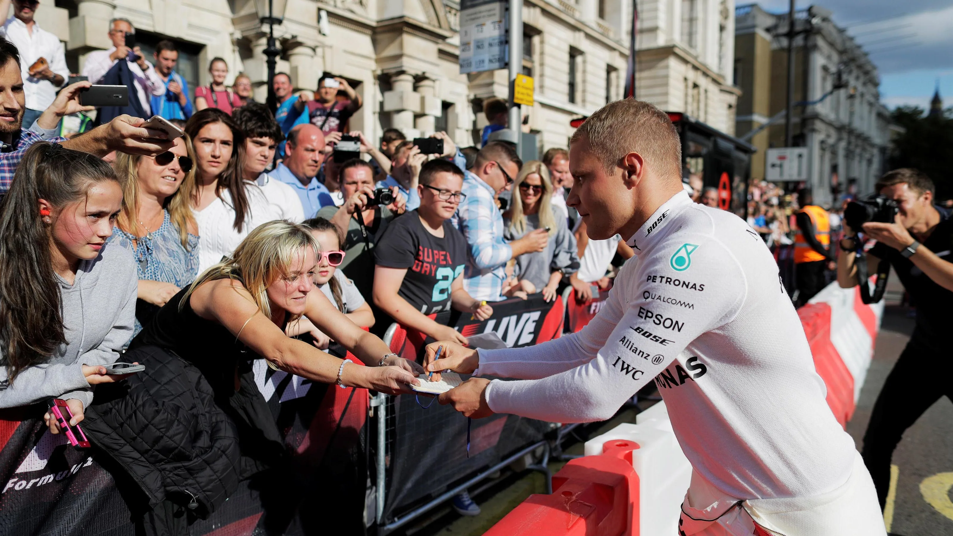 Valtteri Bottas (FIN) Mercedes AMG F1 signs autographs for the fans at F1 London Live, Trafalgar