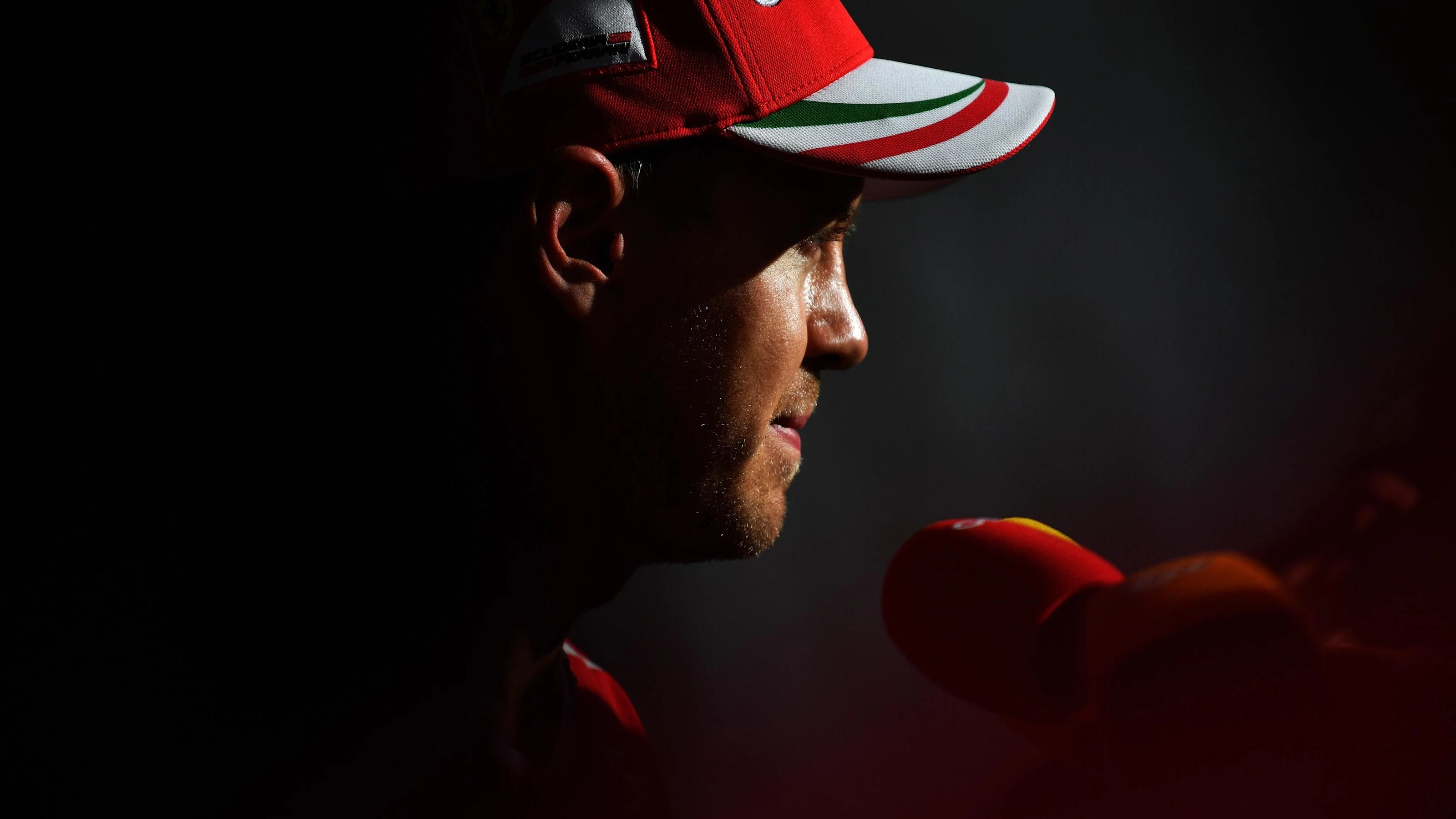 Sebastian Vettel (GER) Ferrari talks with the media after Q1 at Formula One World Championship,