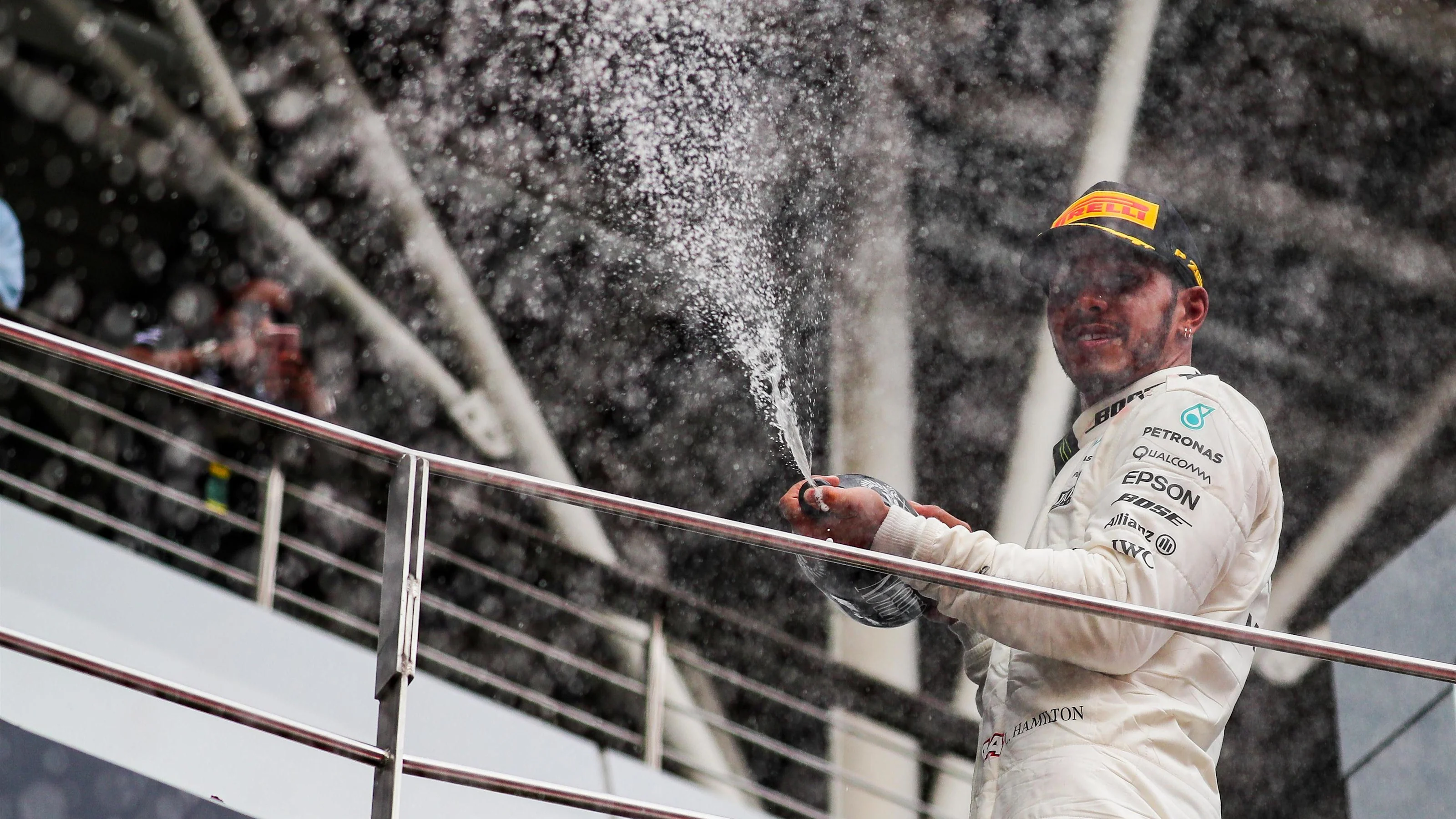 Lewis Hamilton (GBR) Mercedes AMG F1 celebrates on the podium with the champagne at Formula One