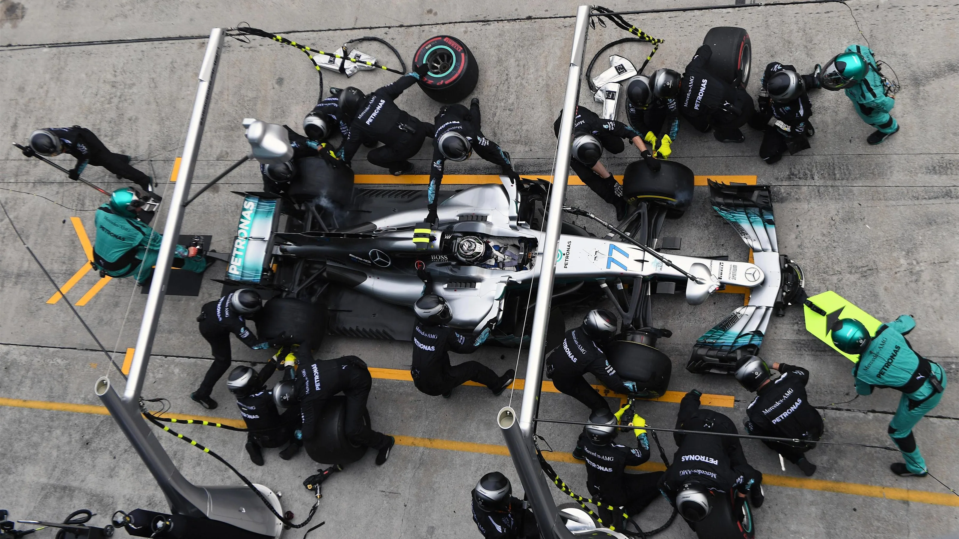 Valtteri Bottas (FIN) Mercedes-Benz F1 W08 Hybrid pit stop at Formula One World Championship, Rd15,