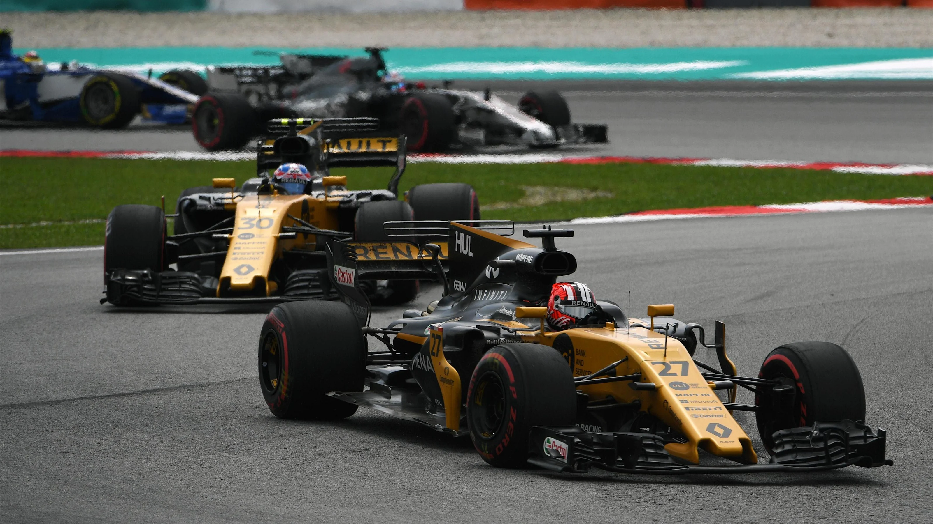 Nico Hulkenberg (GER) Renault Sport F1 Team RS17 leads Jolyon Palmer (GBR) Renault Sport F1 Team