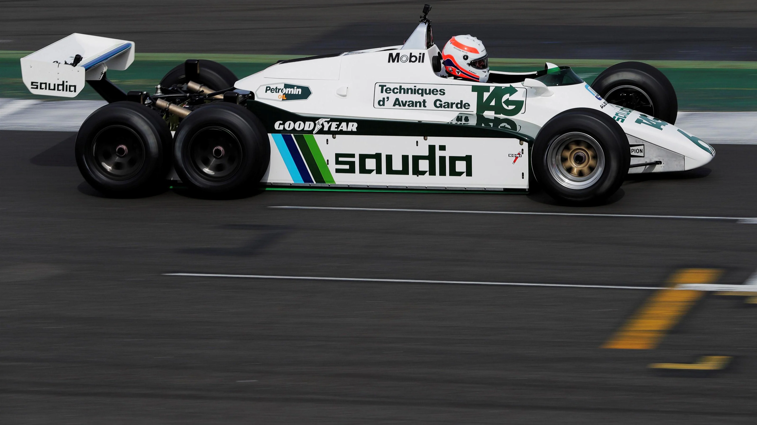 Martin Brundle (GBR) and the six-wheeled Williams FW08B at Williams British Grand Prix Preview Day,
