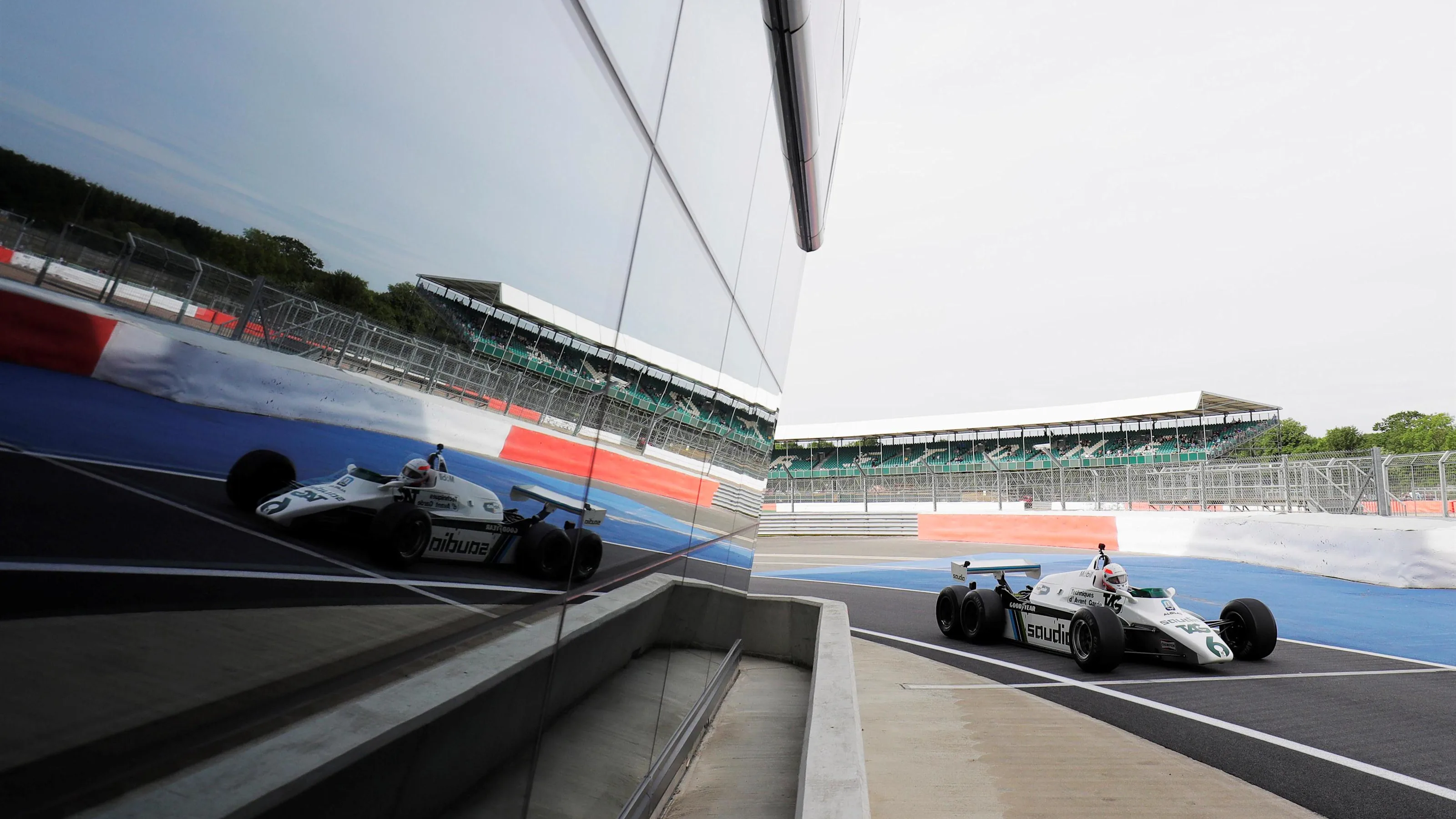 Martin Brundle (GBR) and the six-wheeled Williams FW08B at Williams British Grand Prix Preview Day,
