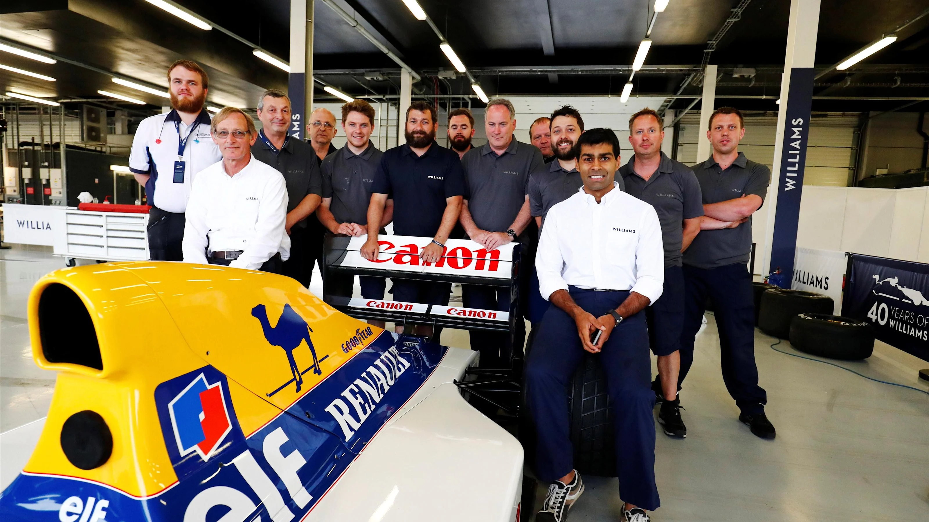 Karun Chandhok (IND) and Dickie Stanford (GBR) in the group photo with the Williams Renault FW14B