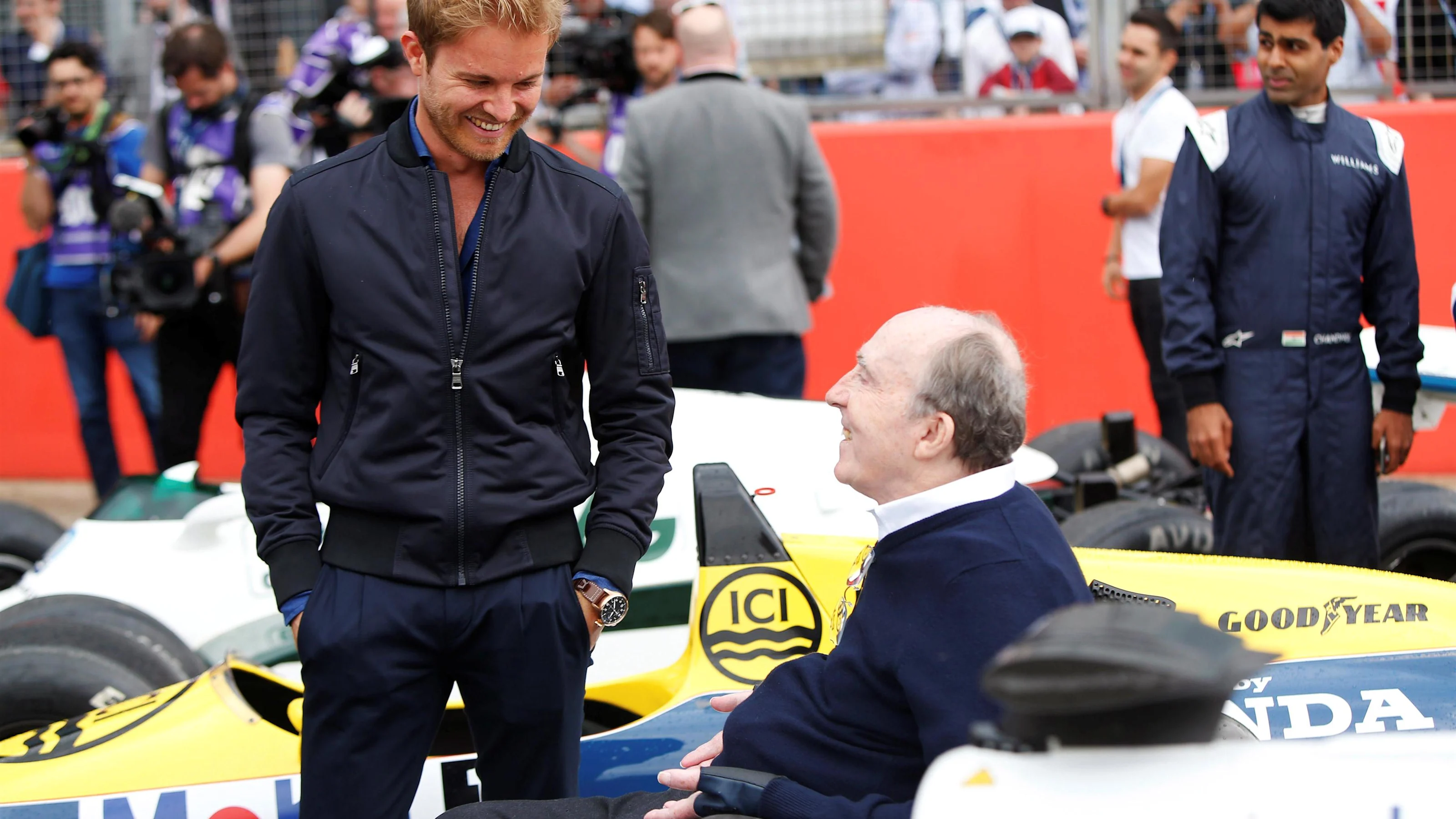 Nico Rosberg (GER) Mercedes-Benz Ambassador talks to Frank Williams (GBR) Williams Team Owner at