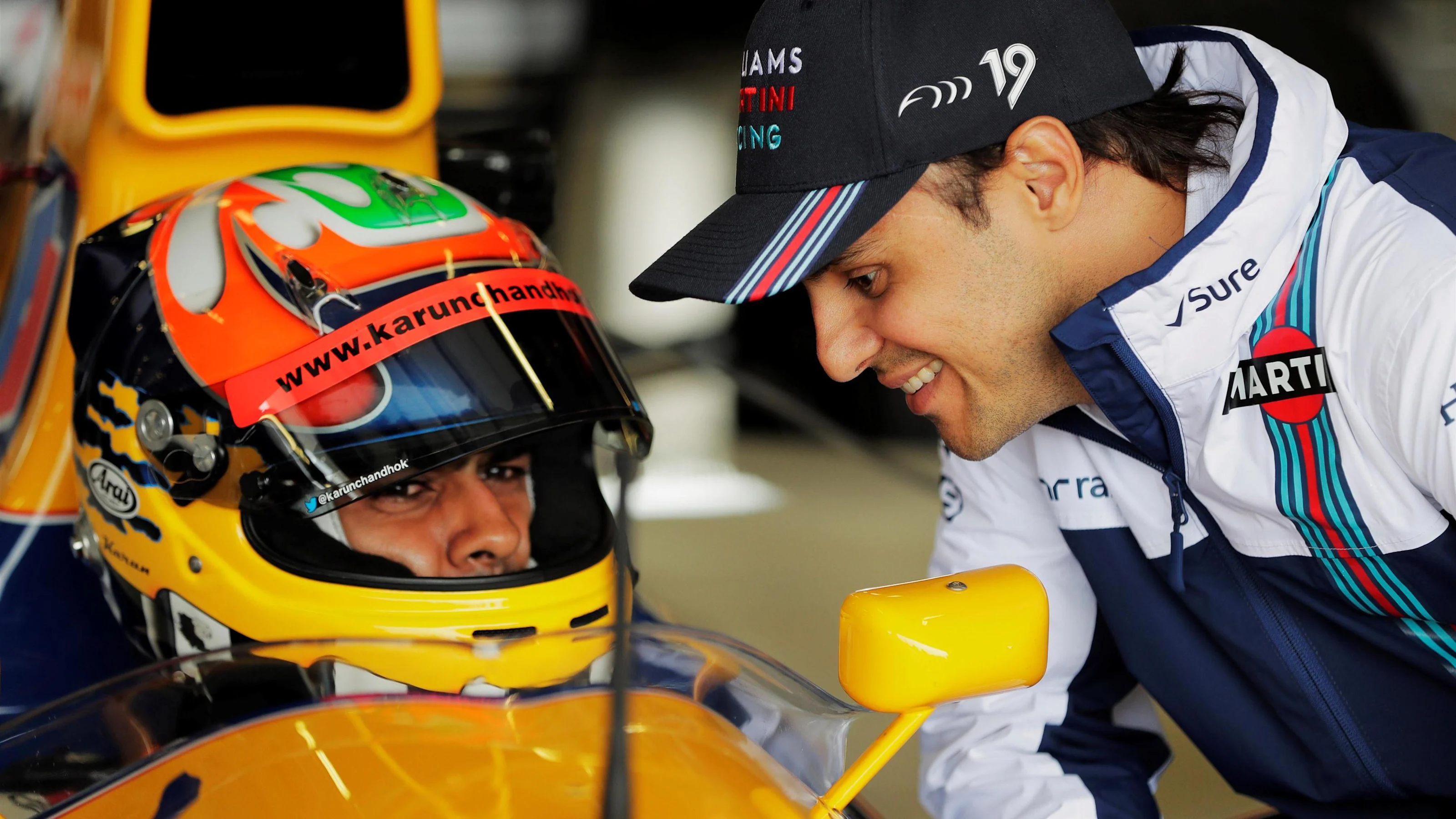 Karun Chandhok (IND) talks to Felipe Massa (BRA) Williams in the Williams Renault FW14B at Williams