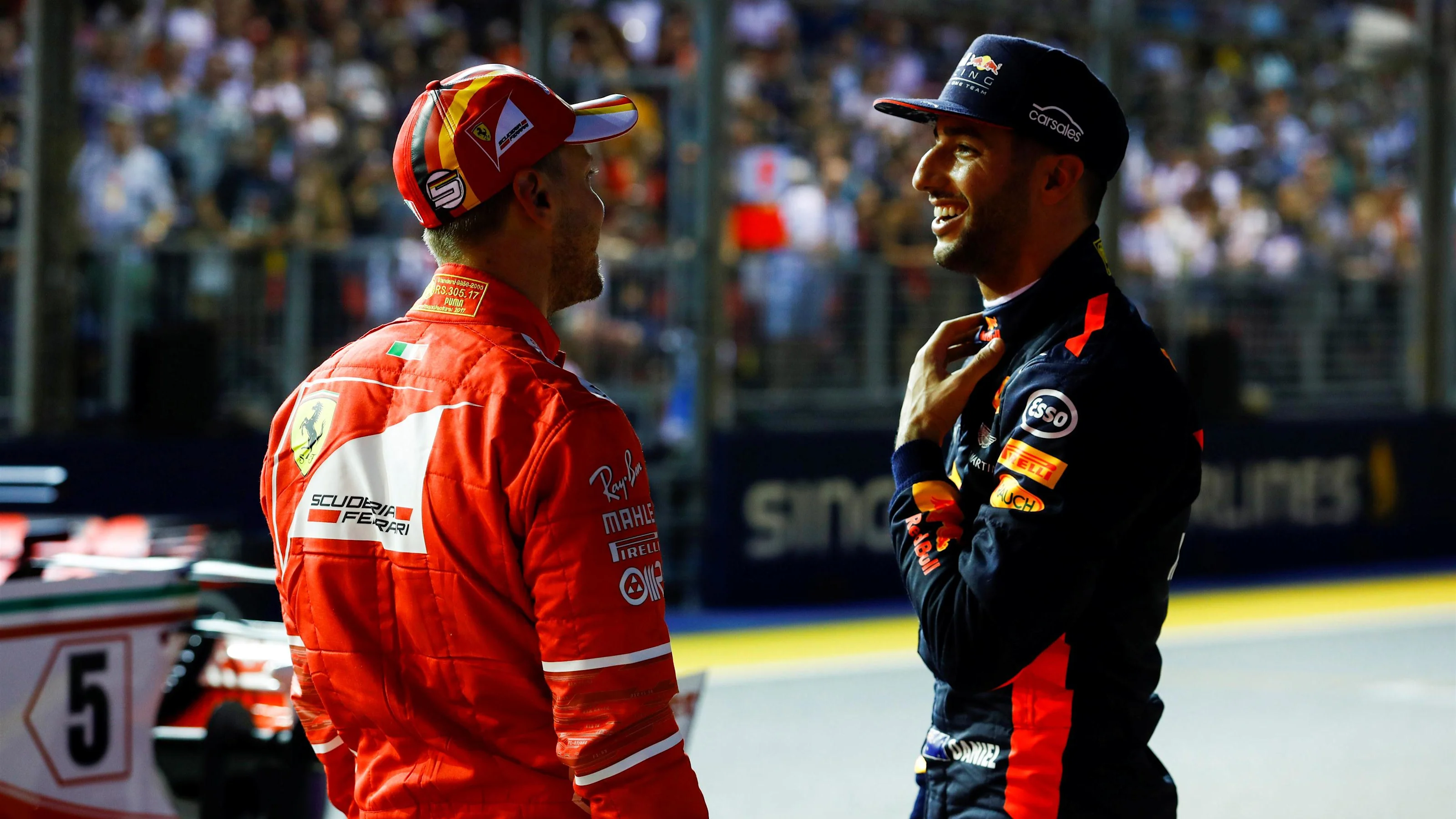 Pole sitter Sebastian Vettel (GER) Ferrari and Daniel Ricciardo (AUS) Red Bull Racing in parc ferme