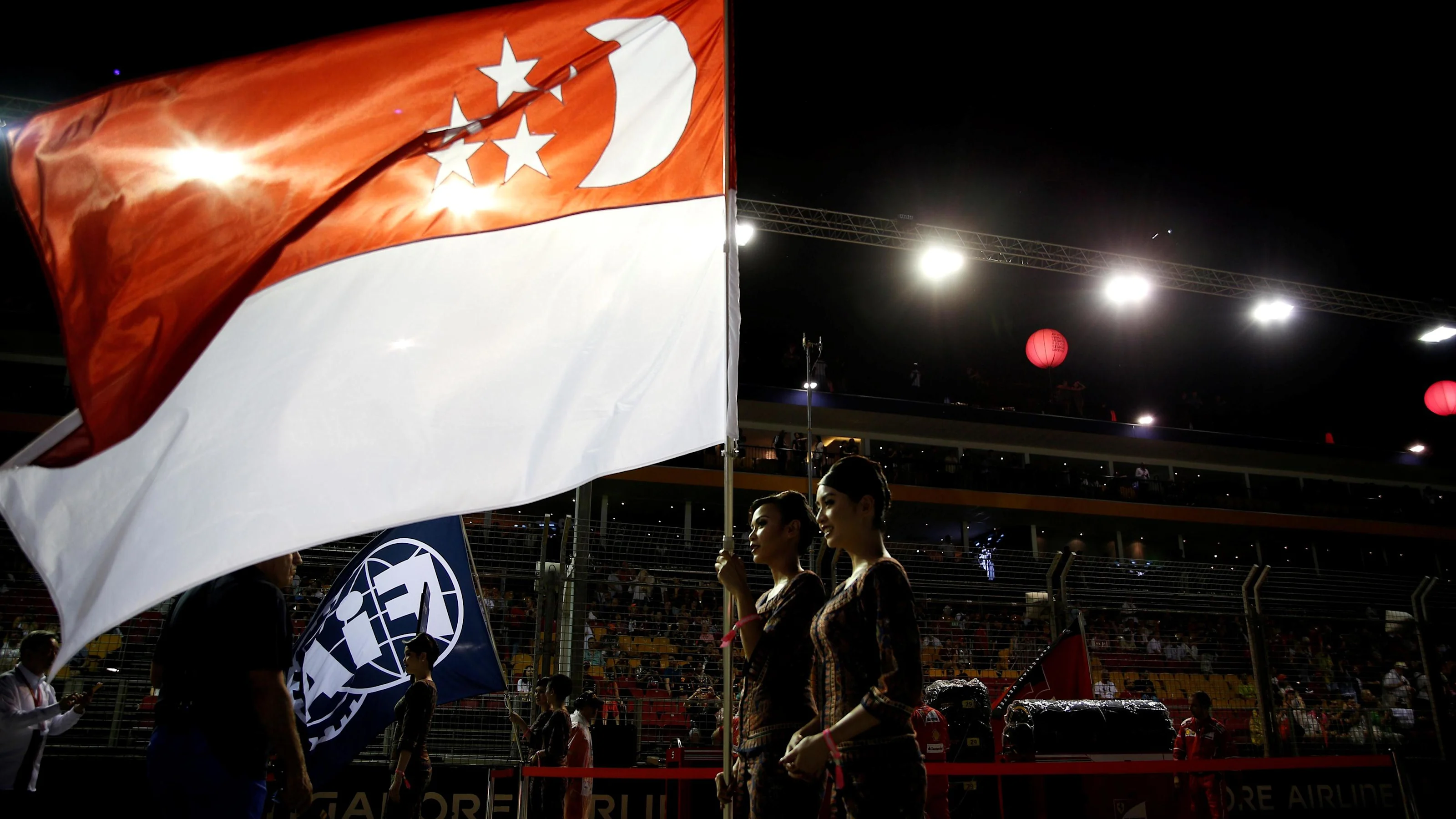 National Anthem is observed with Flag of Singapore on the grid at Formula One World Championship,