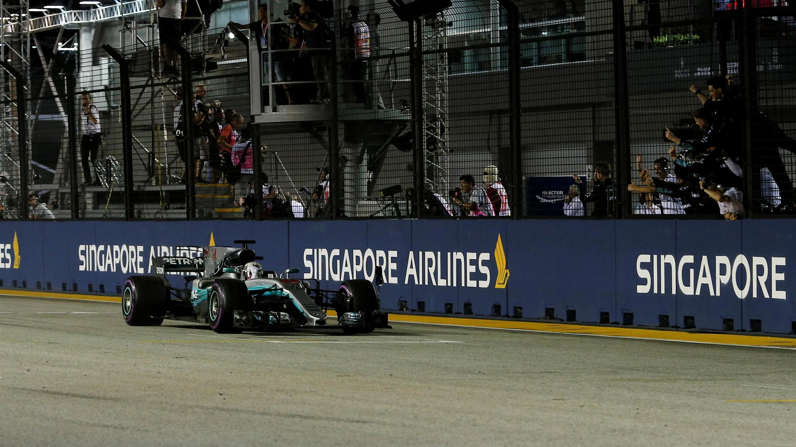Race winner Lewis Hamilton (GBR) Mercedes-Benz F1 W08 Hybrid crosses the line at Formula One World
