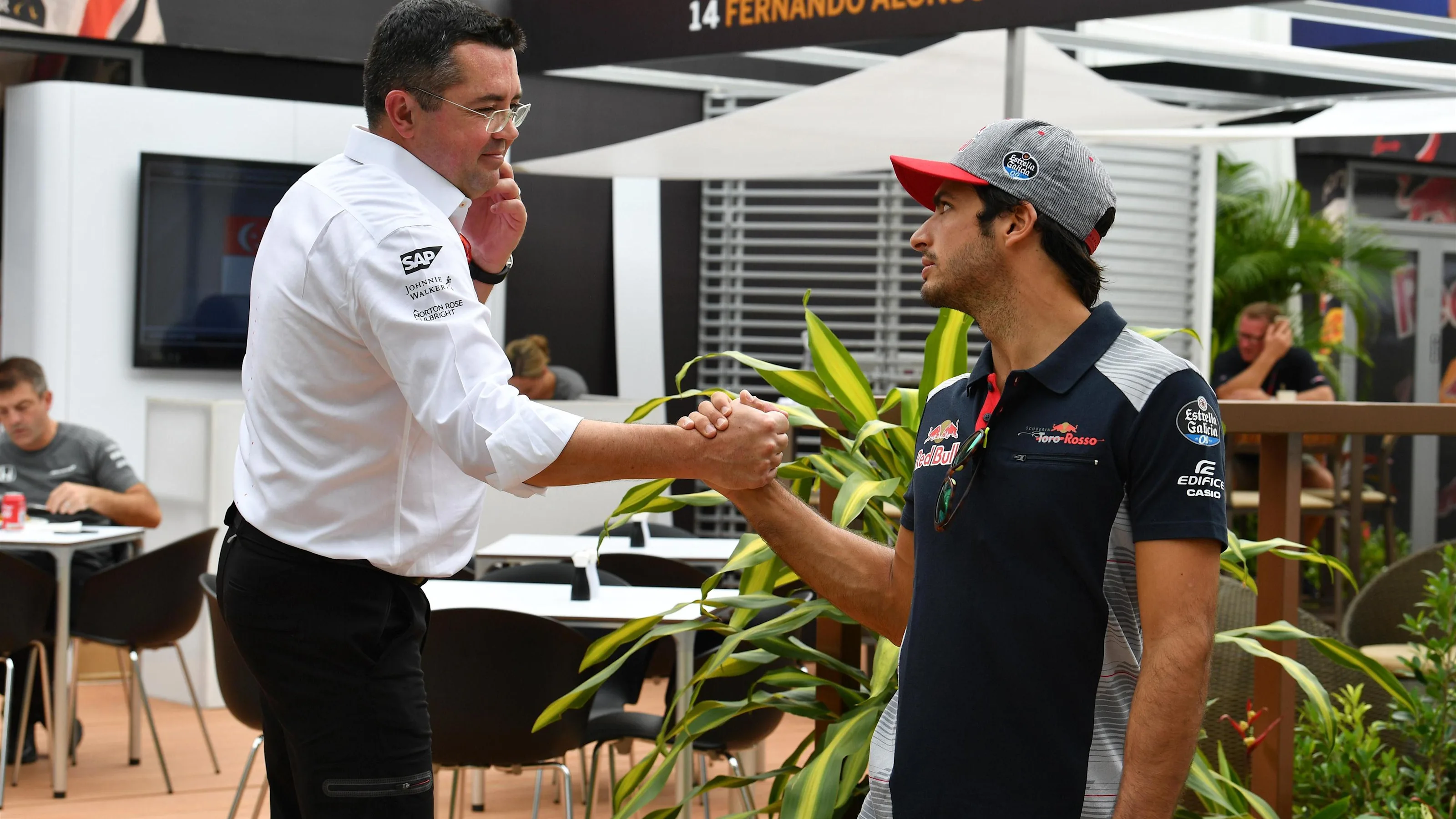 Eric Boullier (FRA) McLaren Racing Director and Carlos Sainz jr (ESP) Scuderia Toro Rosso at