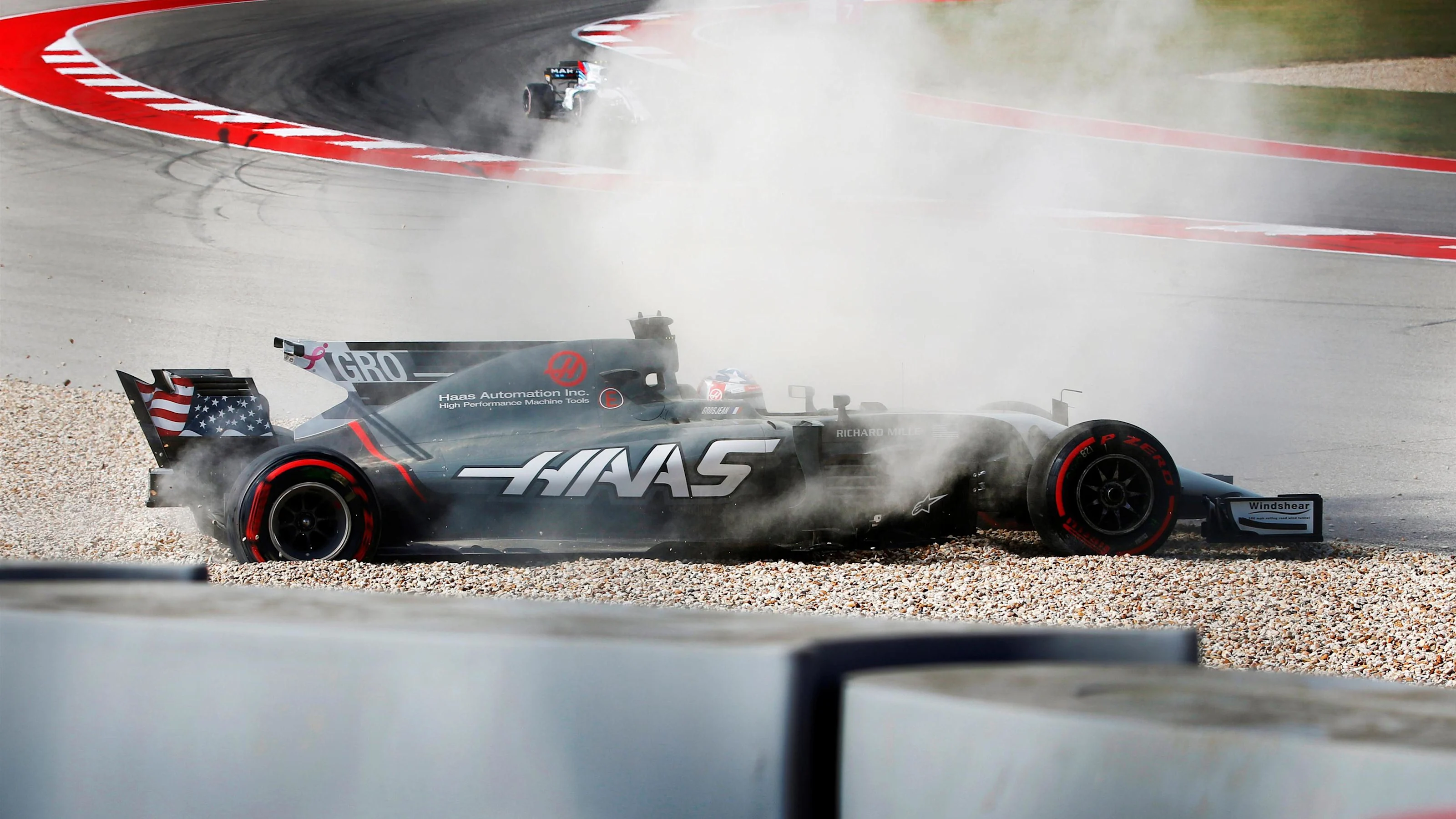 Romain Grosjean (FRA) Haas VF-17 spins into the gravel in FP3 at Formula One World Championship,