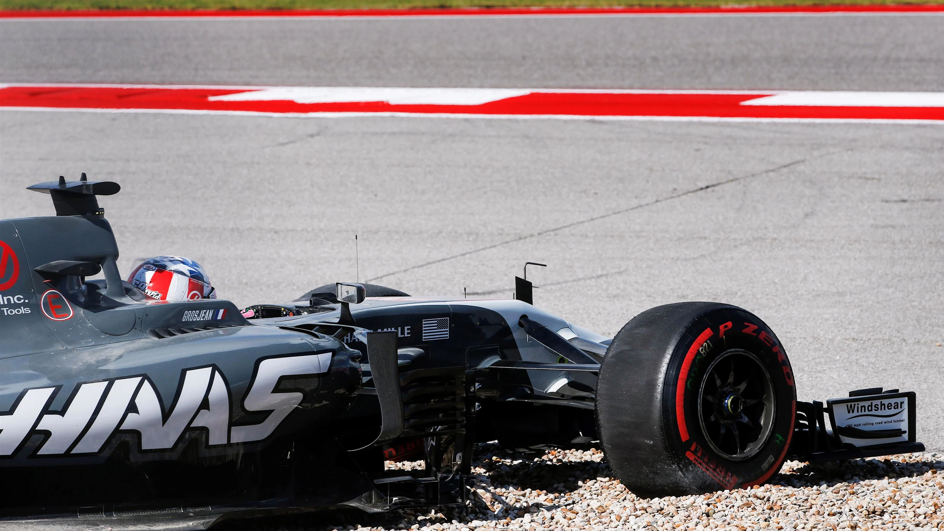 Romain Grosjean (FRA) Haas VF-17 spins into the gravel in FP3 at Formula One World Championship,