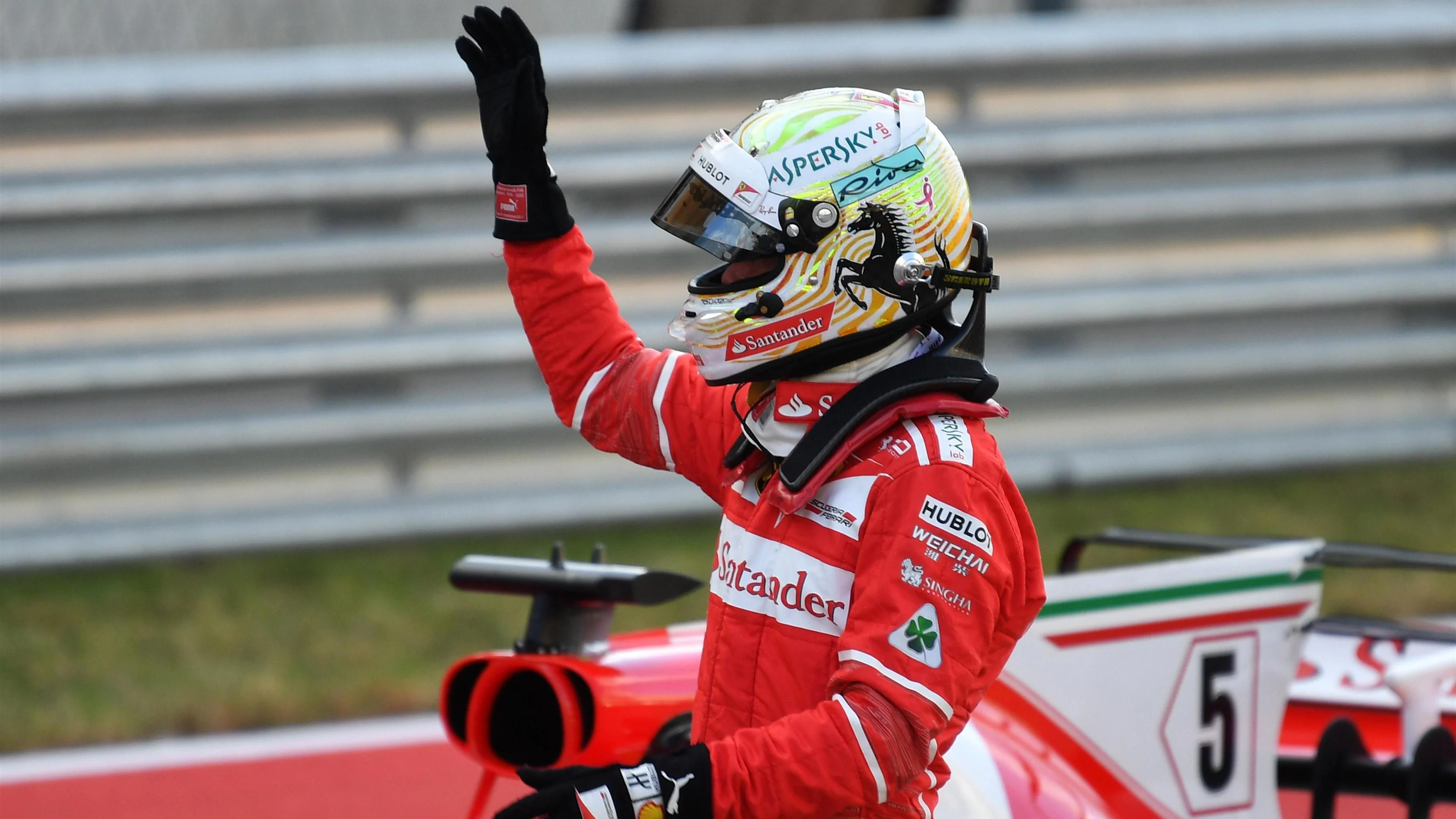 Sebastian Vettel (GER) Ferrari celebrates in parc ferme at Formula One World Championship, Rd17,
