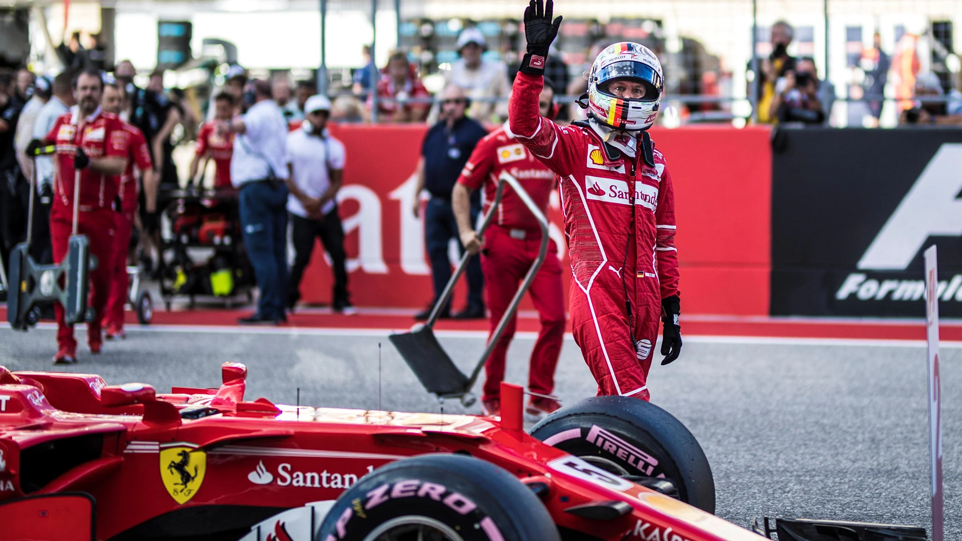 Sebastian Vettel (GER) Ferrari celebrates in parc ferme at Formula One World Championship, Rd17,
