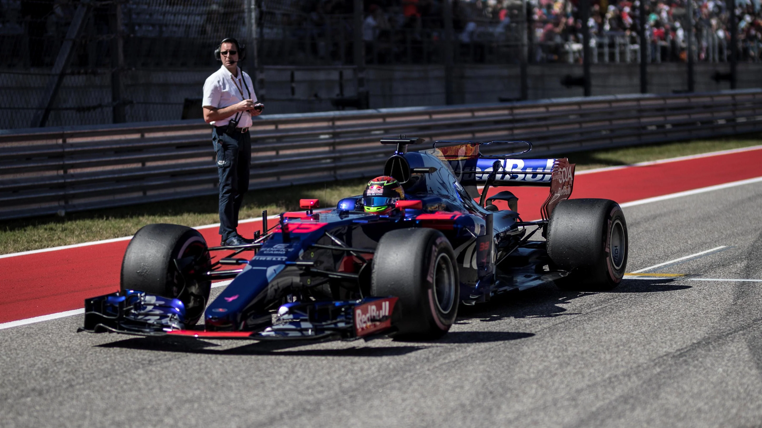 Brendon Hartley (NZL) Scuderia Toro Rosso STR12 on the grid at Formula One World Championship,