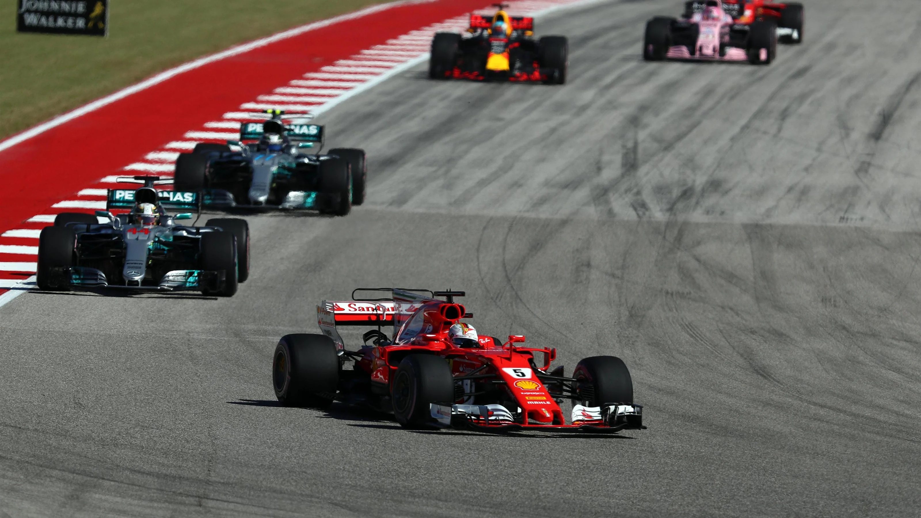 Sebastian Vettel (GER) Ferrari SF70-H leads at thew start of the race at Formula One World