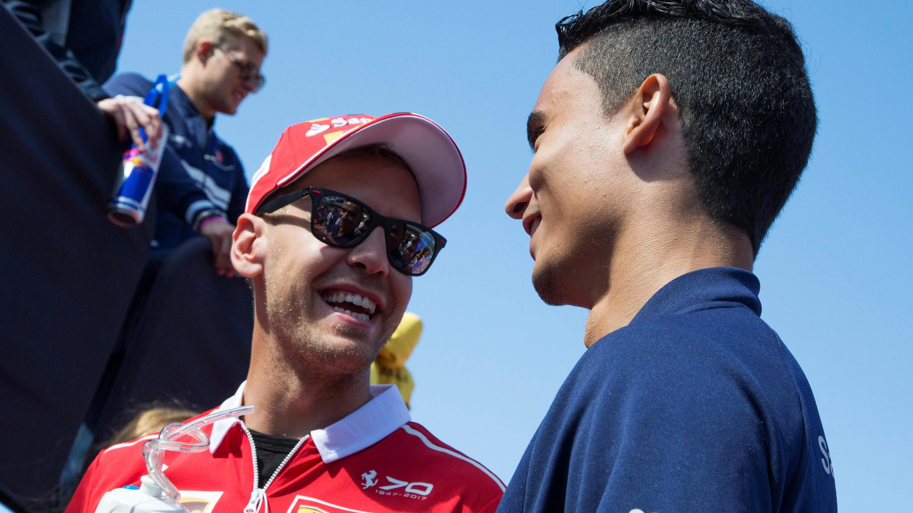 Sebastian Vettel (GER) Ferrari and Pascal Wehrlein (GER) Sauber on the drivers parade at Formula