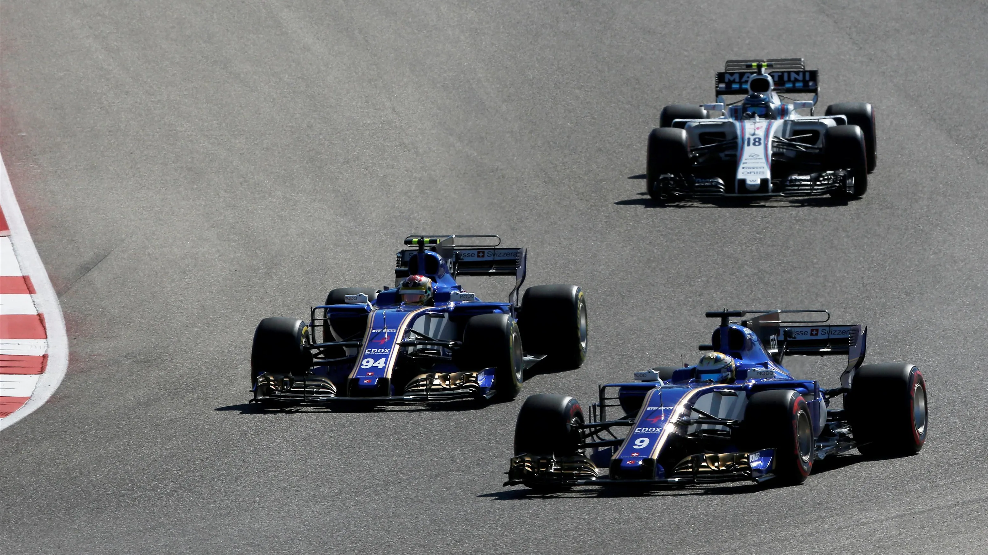 Pascal Wehrlein (GER) Sauber C36 and Marcus Ericsson (SWE) Sauber C36 battle at Formula One World