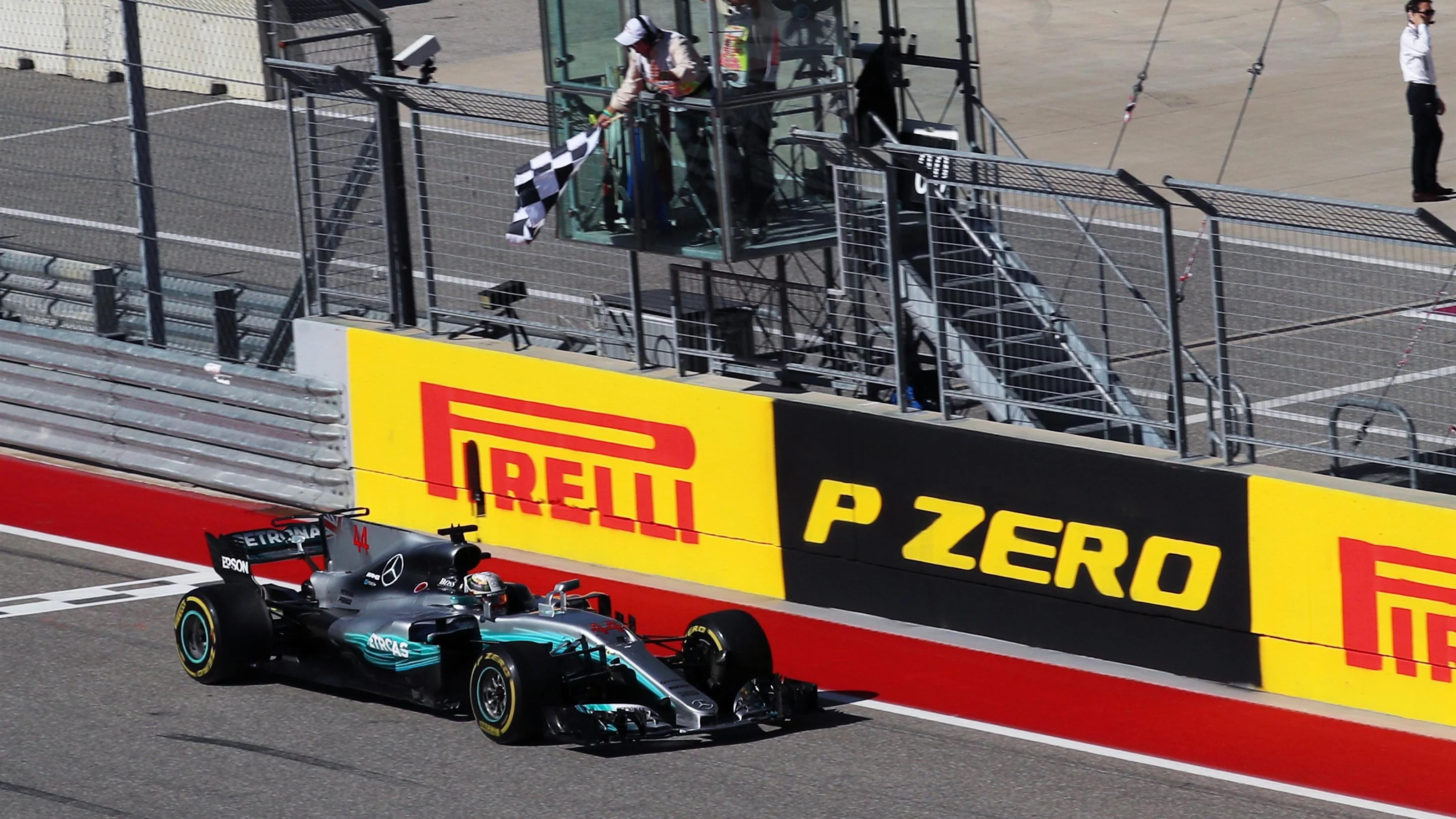 Race winner Lewis Hamilton (GBR) Mercedes-Benz F1 W08 Hybrid takes the chequered flag at Formula