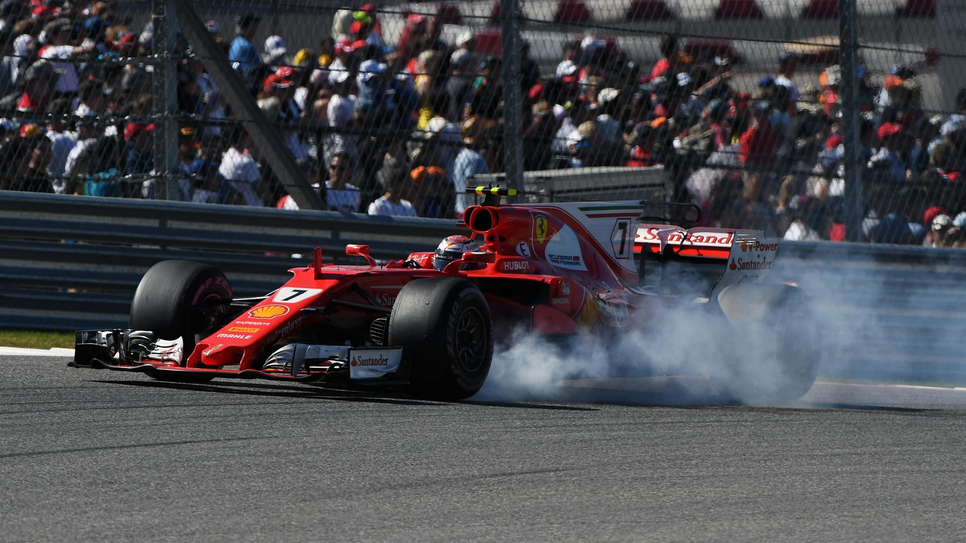 Kimi Raikkonen (FIN) Ferrari SF70-H locks up at Formula One World Championship, Rd17, United States