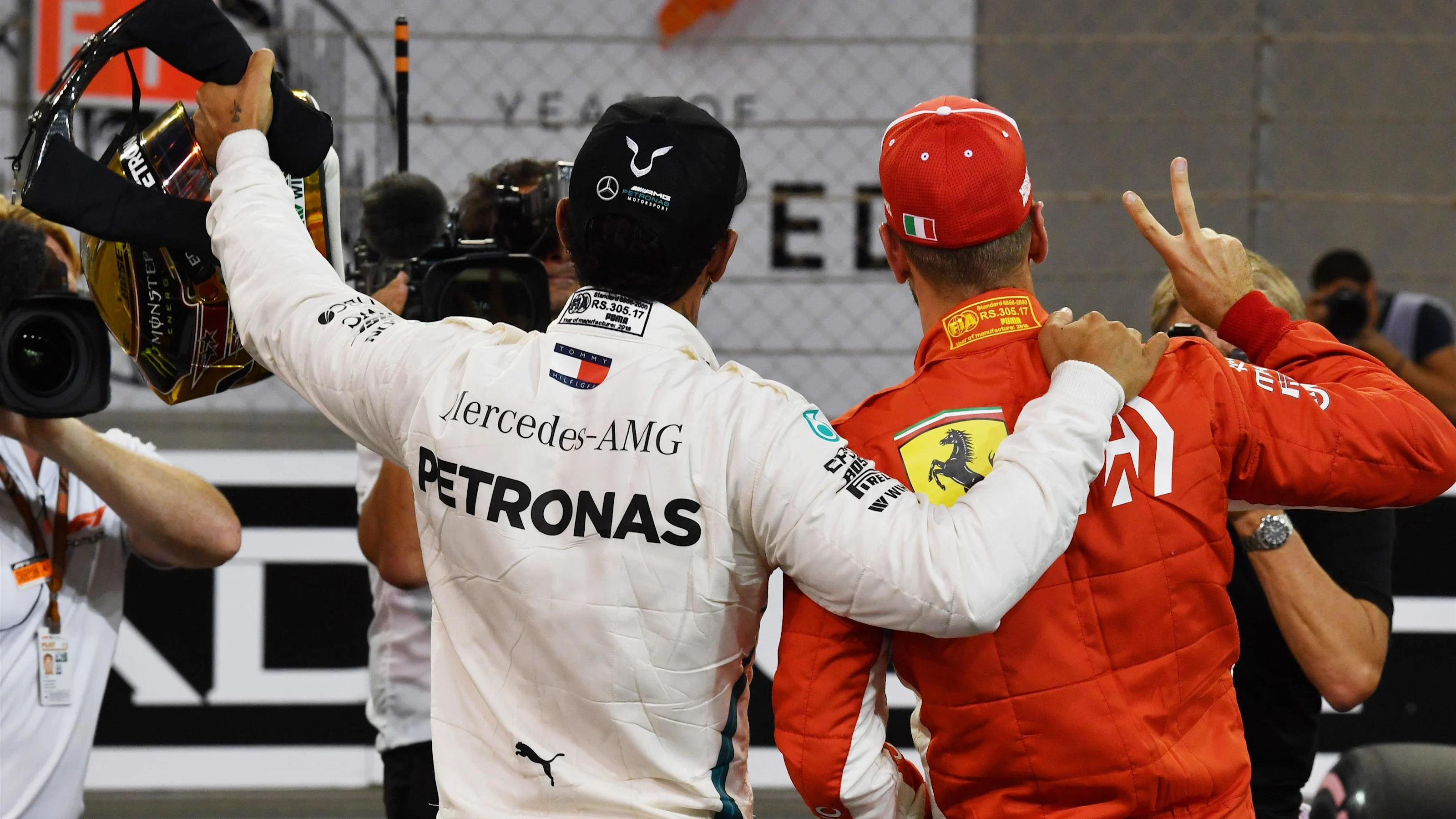 Lewis Hamilton, Mercedes AMG F1 and Sebastian Vettel, Ferrari celebrate in Parc Ferme at Formula