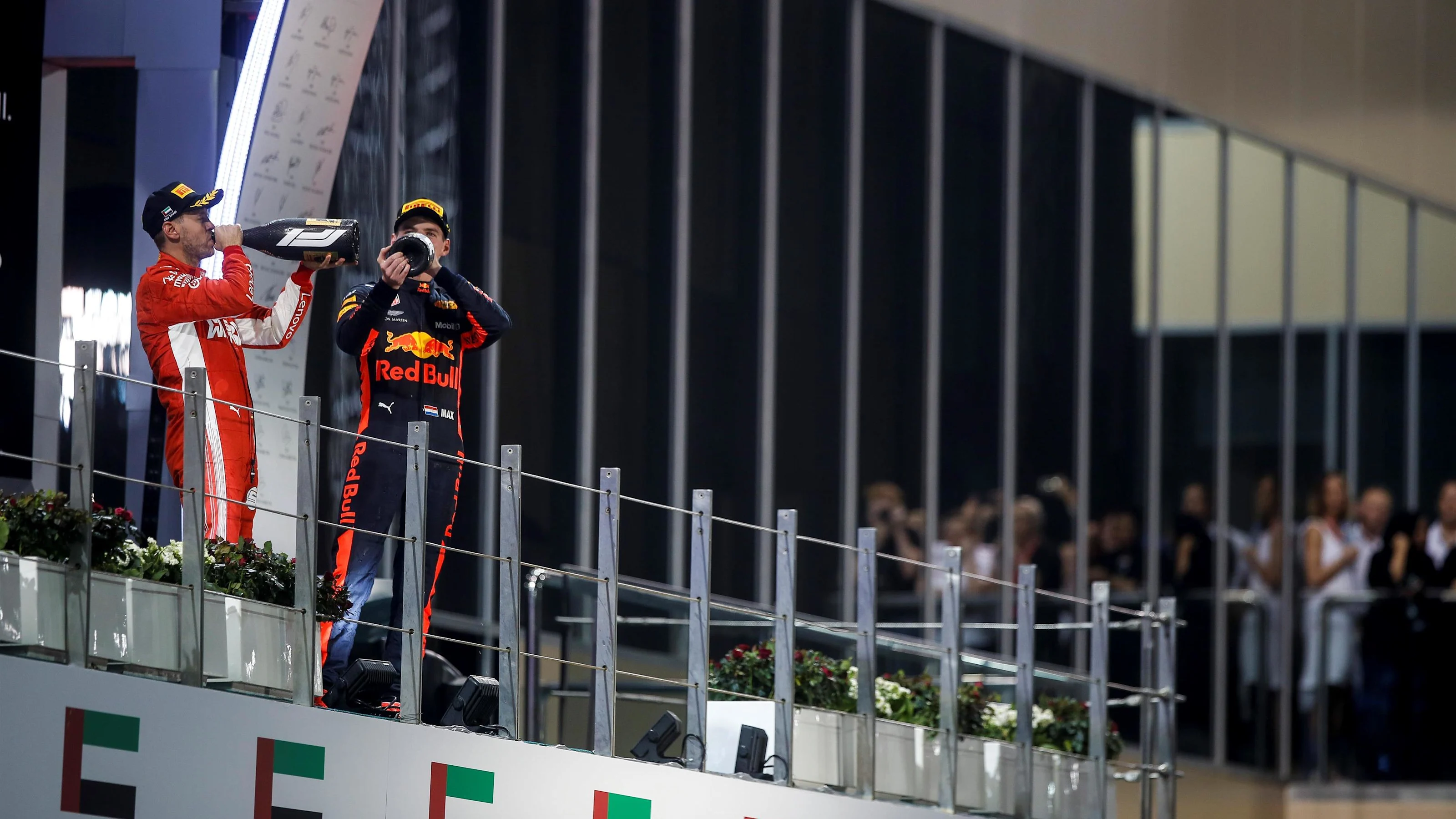 Sebastian Vettel, Ferrari and Max Verstappen, Red Bull Racing celebrate on the podium at Formula