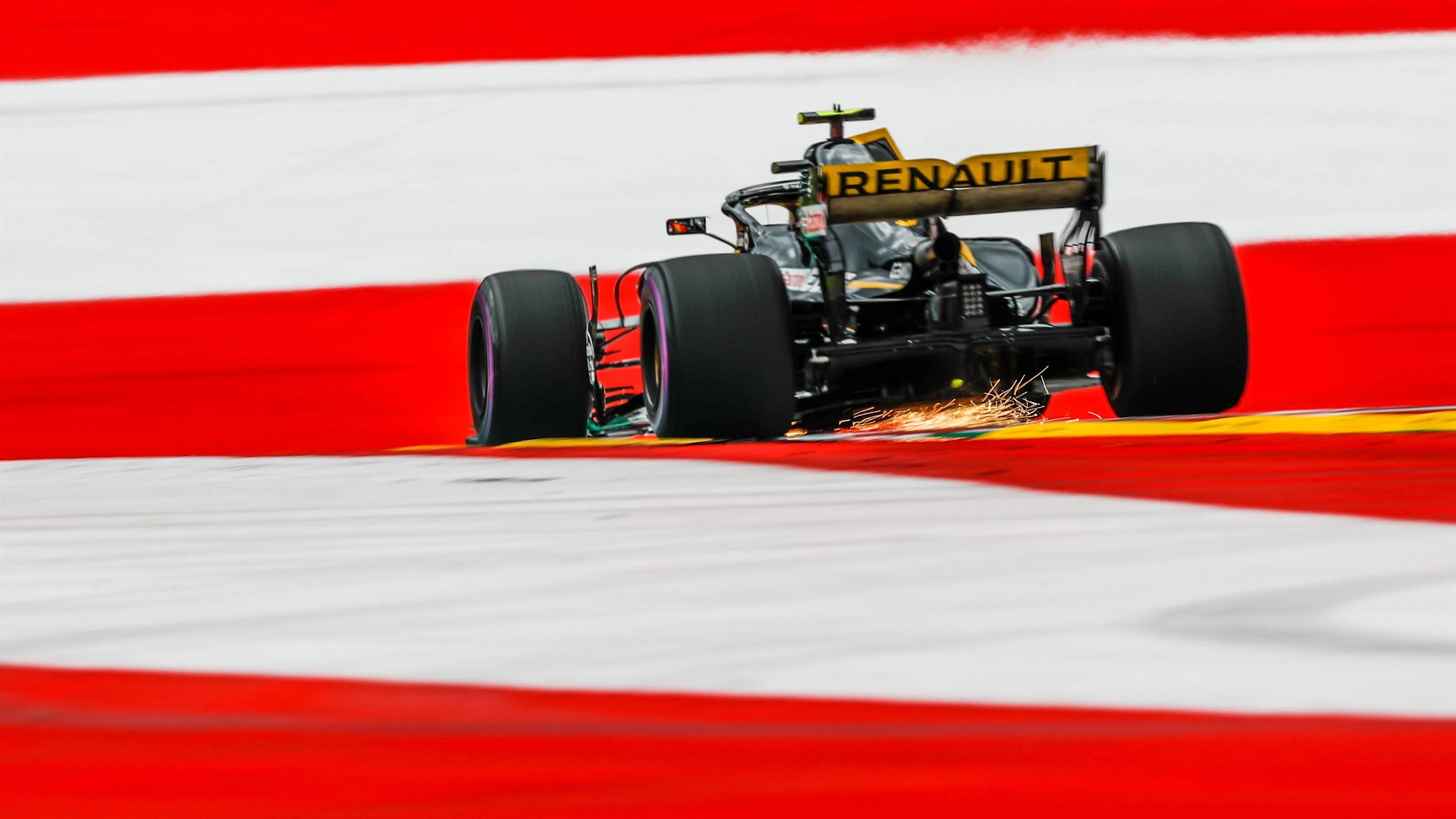 Carlos Sainz jr (ESP) Renault Sport F1 Team RS18 sparks at Formula One World Championship, Rd9,
