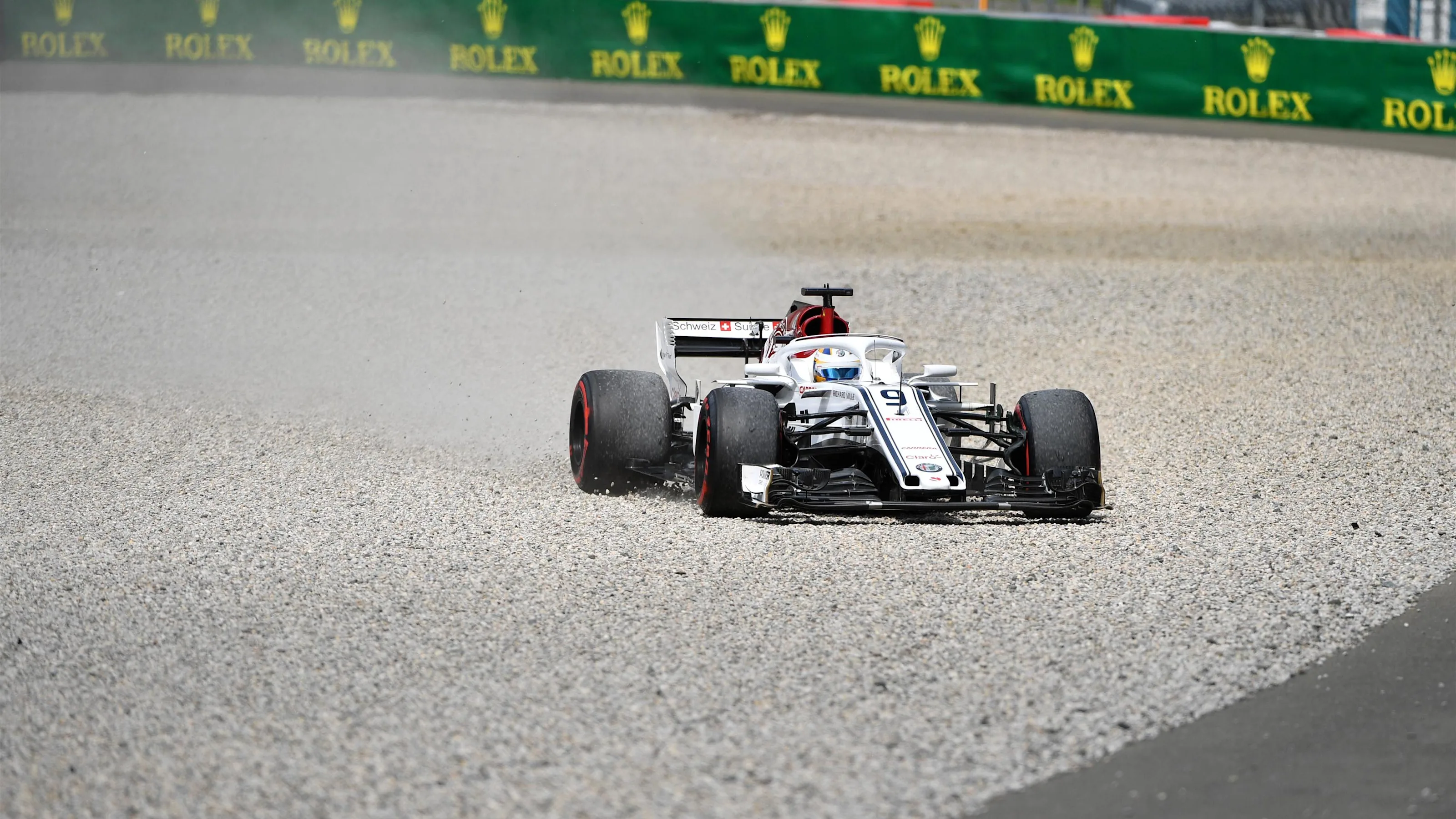 Marcus Ericsson (SWE) Alfa Romeo Sauber C37 runs through the gravel at Formula One World