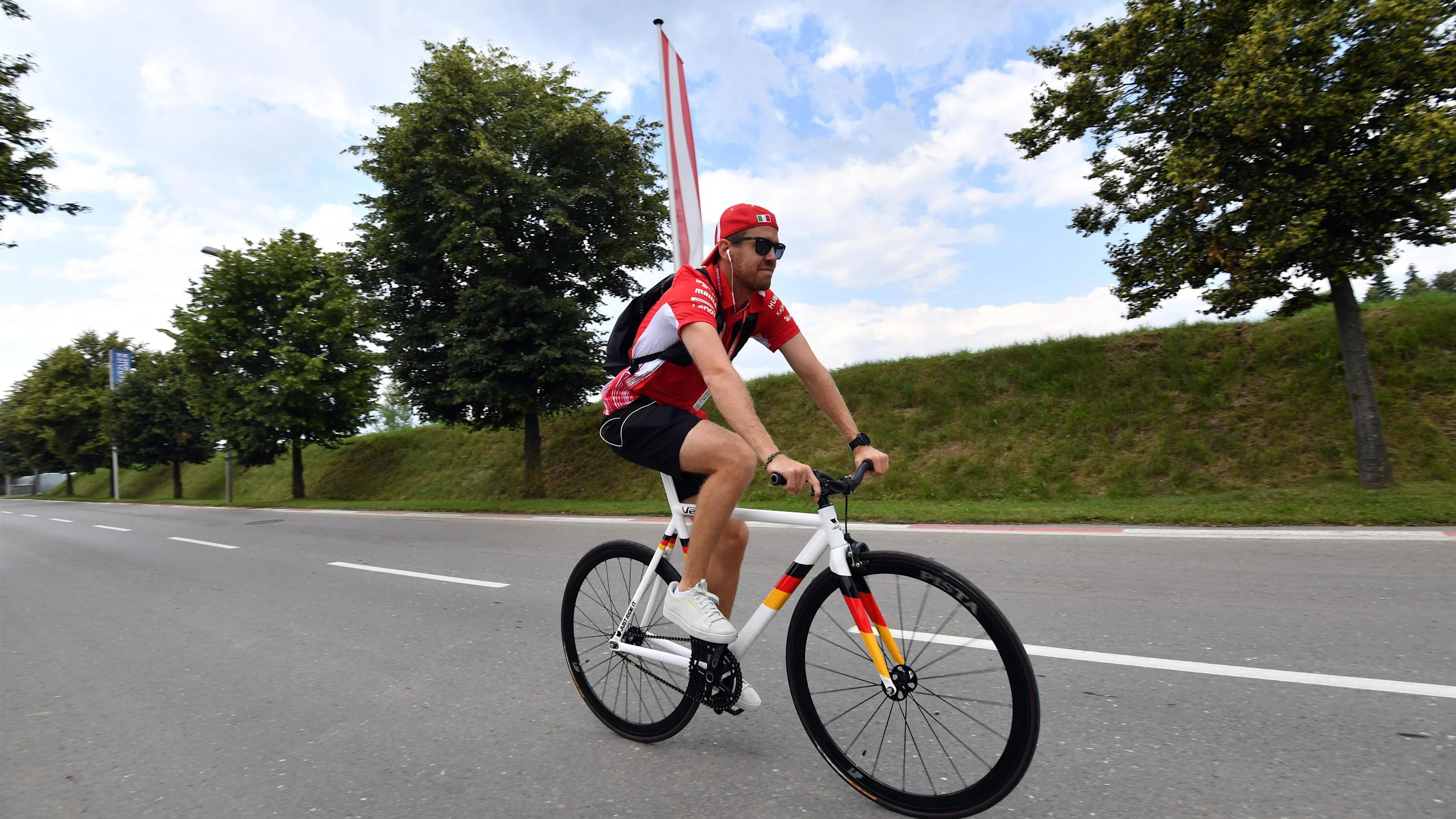 Sebastian Vettel (GER) Ferrari on his bike at Formula One World Championship, Rd9, Austrian Grand