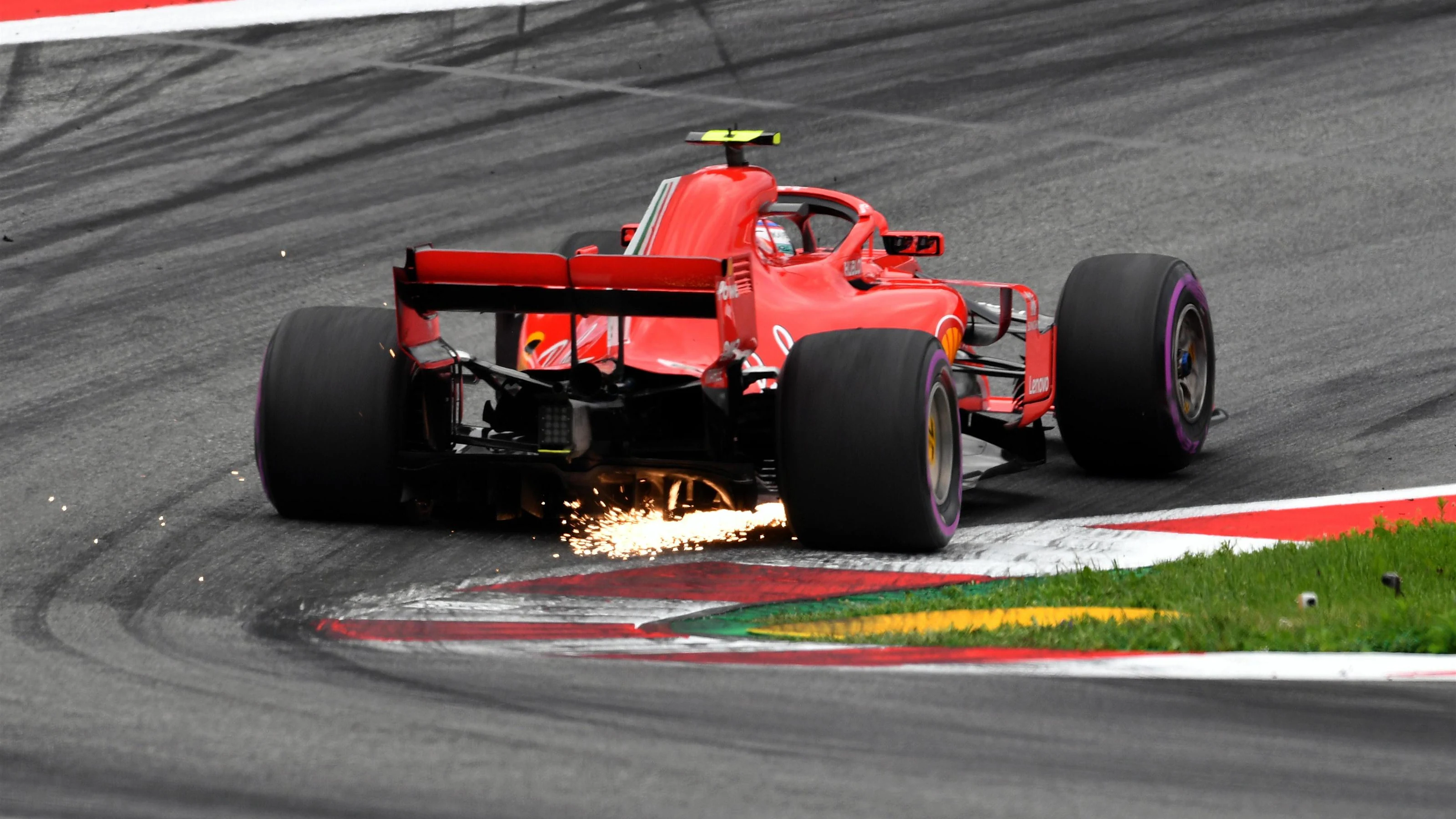 Kimi Raikkonen (FIN) Ferrari SF-71H sparks at Formula One World Championship, Rd9, Austrian Grand