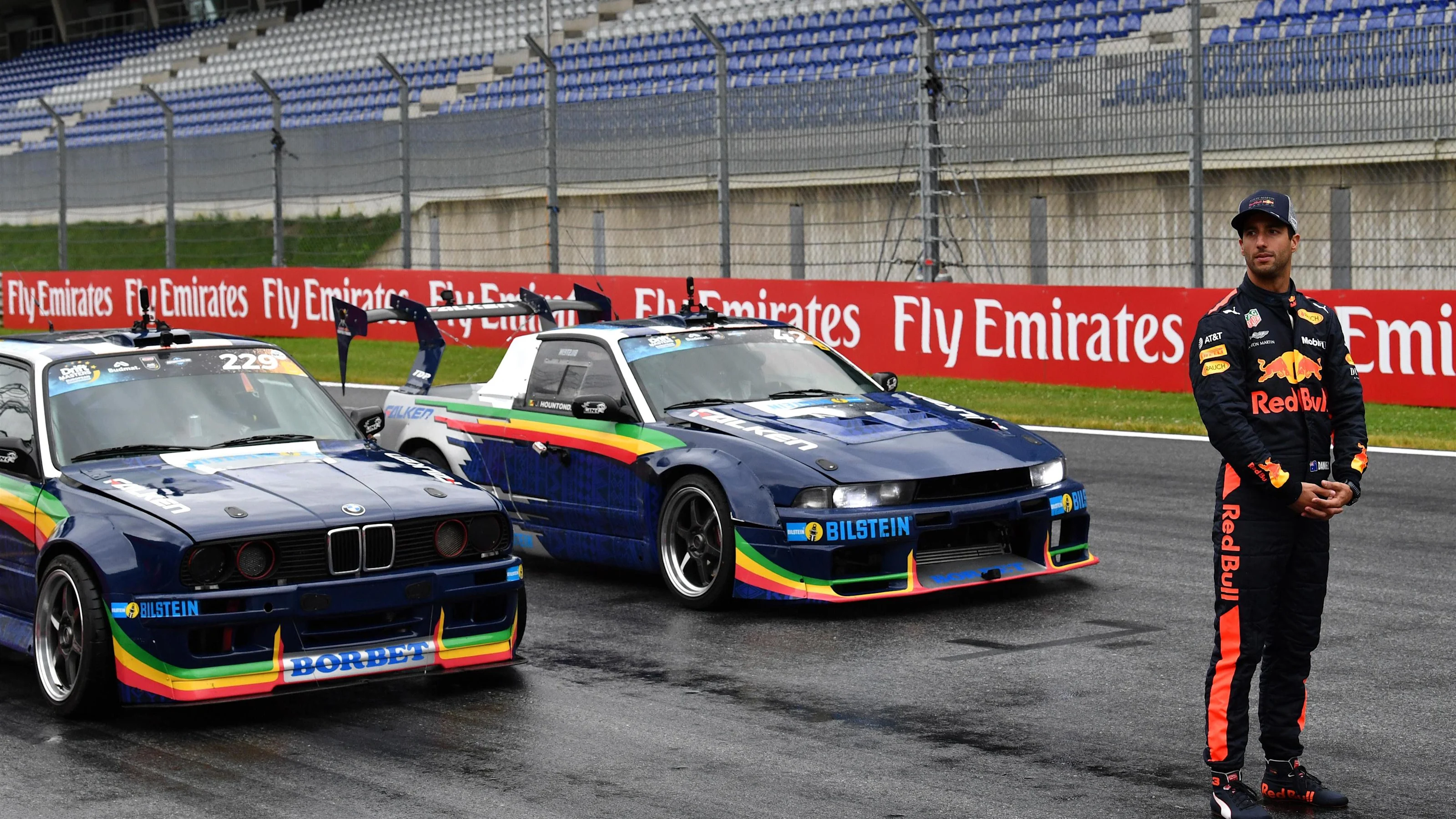 Daniel Ricciardo (AUS) Red Bull Racing and drift cars at Formula One World Championship, Rd9,