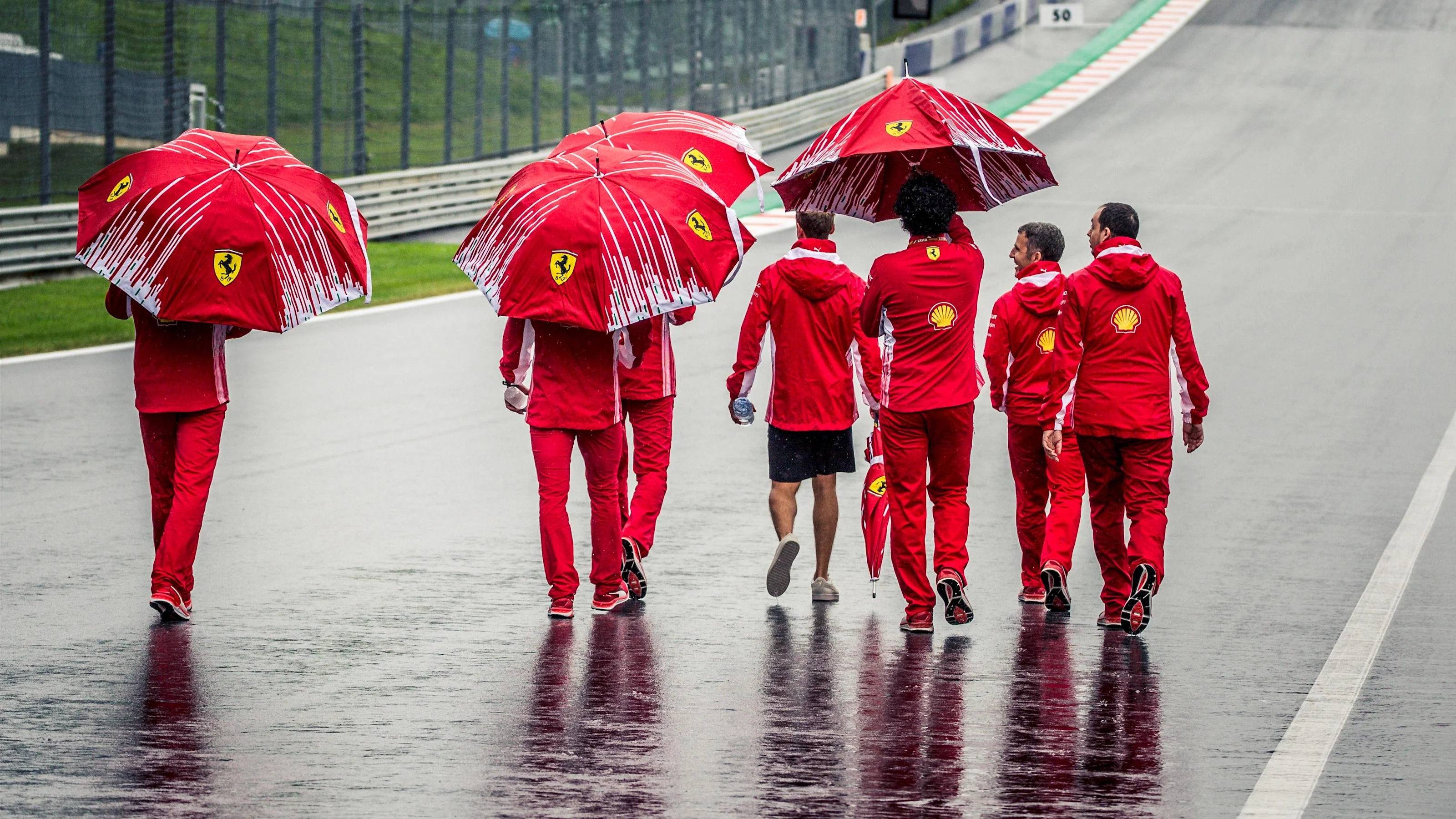Sebastian Vettel (GER) Ferrari walks the track with the team at Formula One World Championship,