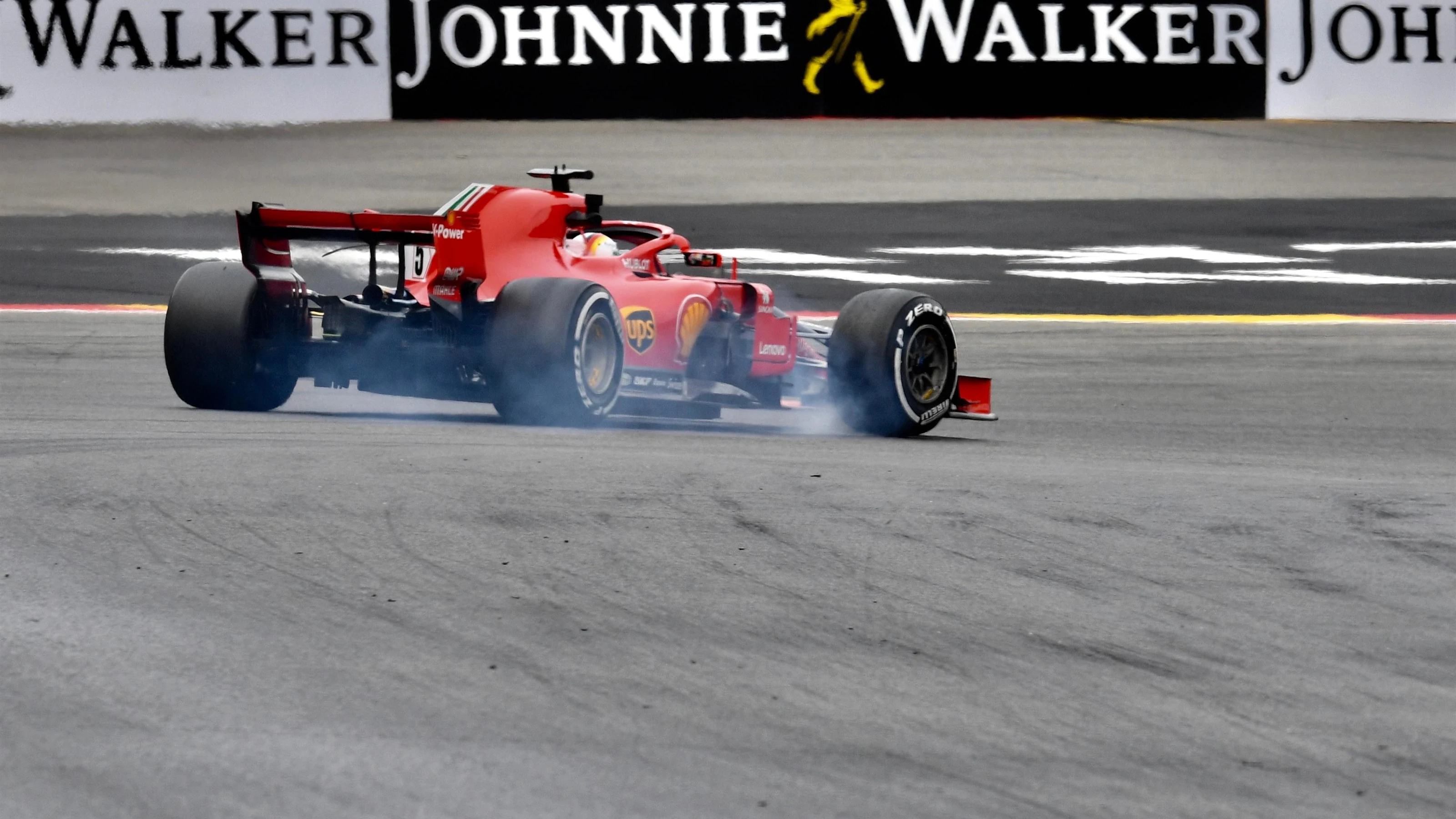 Sebastian Vettel, Ferrari SF71H locks front tyre at Formula One World Championship, Rd13, Belgian