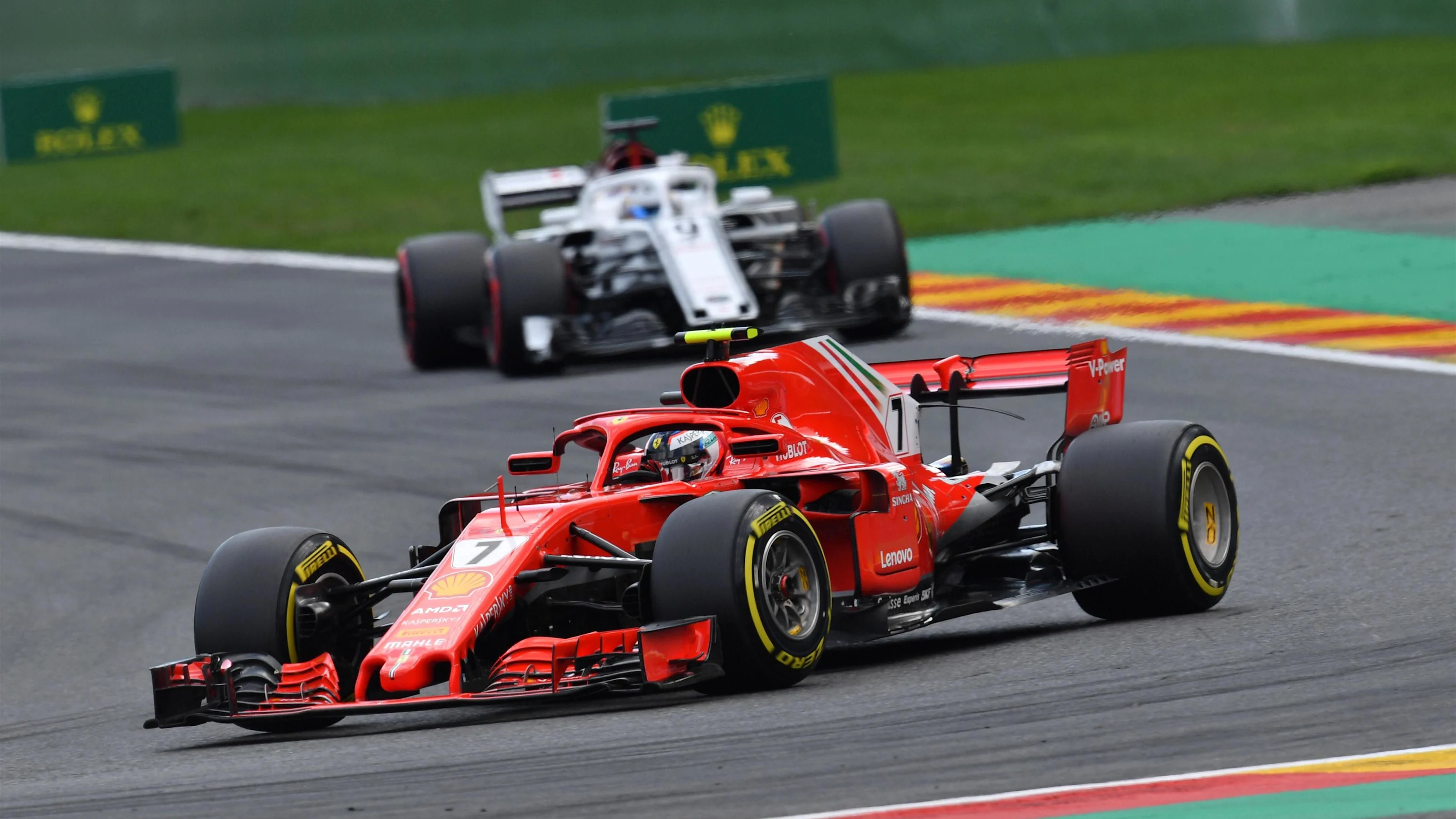 Kimi Raikkonen, Ferrari SF71H and Marcus Ericsson, Alfa Romeo Sauber C37 at Formula One World