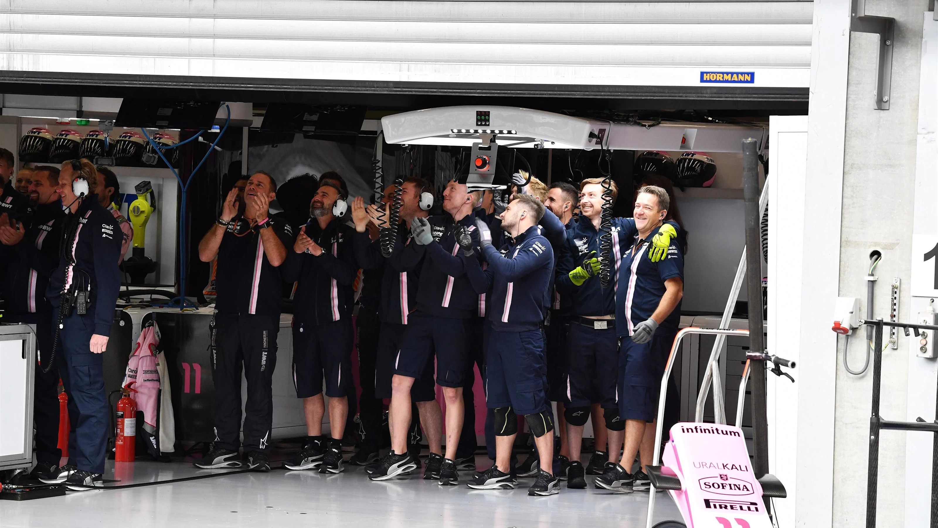 Racing Point Force India F1 Team celebrate in the garage at Formula One World Championship, Rd13,