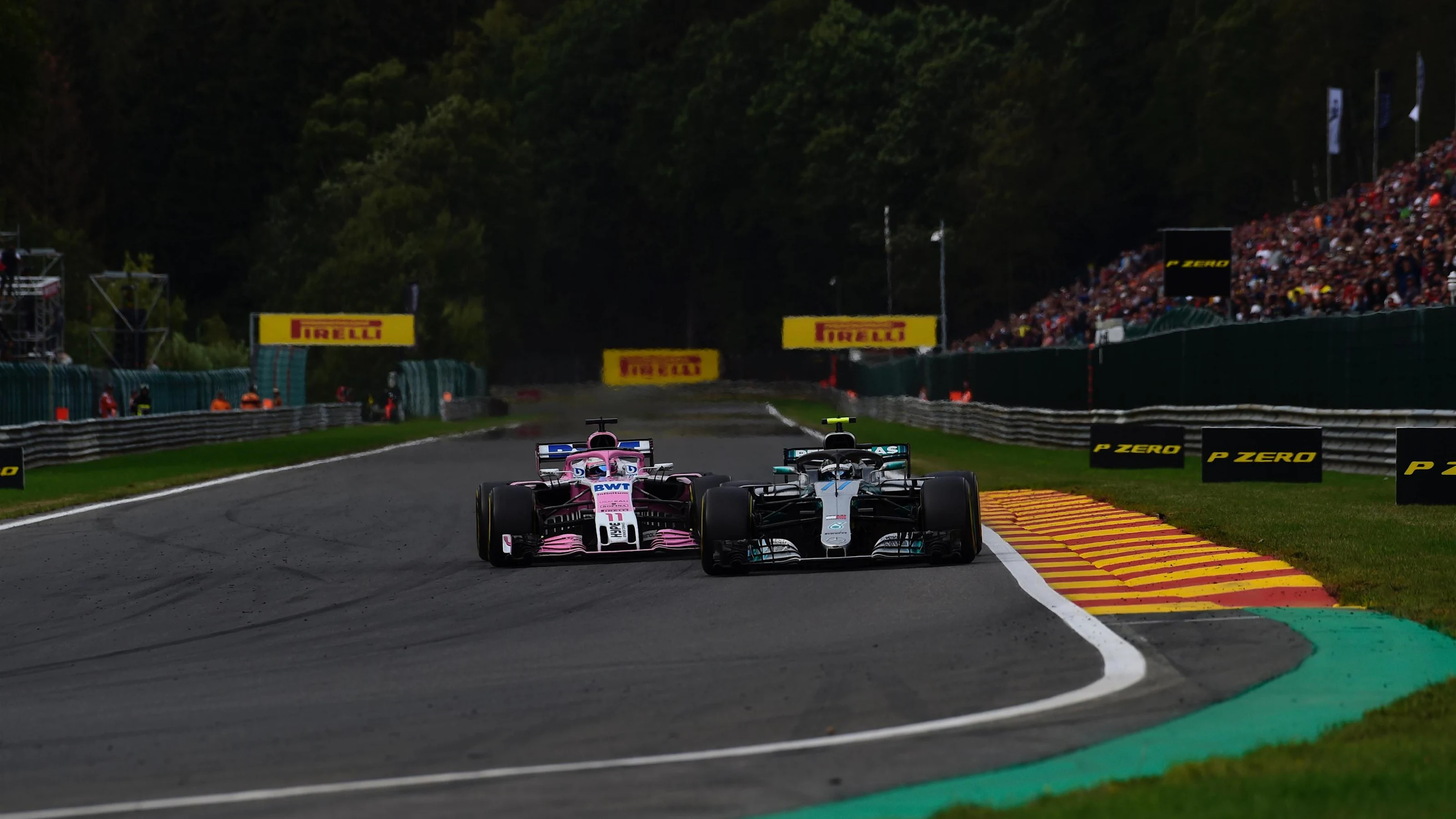 Valtteri Bottas, Mercedes AMG F1 W09 and Sergio Perez, Racing Point Force India VJM11 at Formula