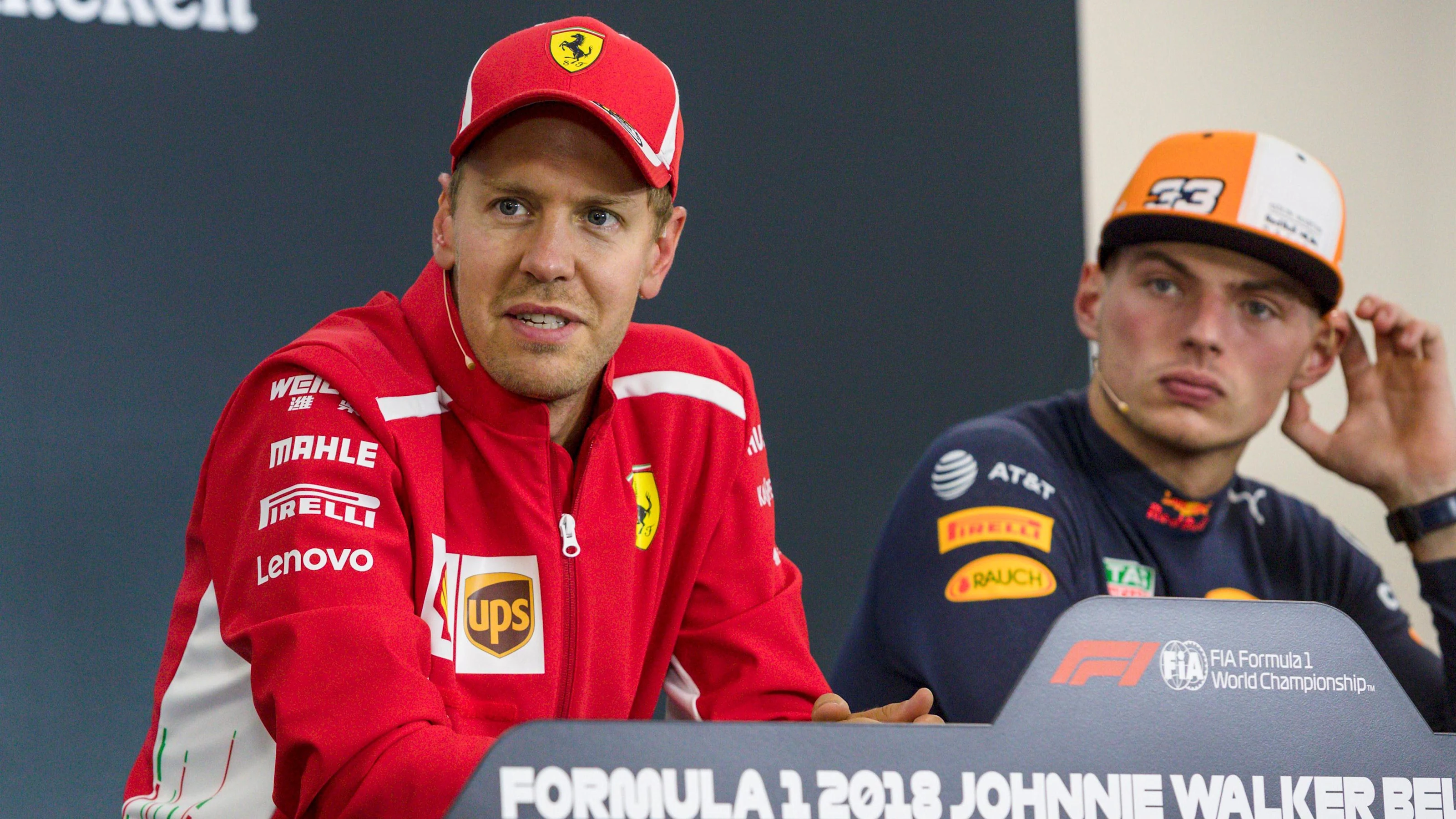 (L to R): Sebastian Vettel, Ferrari and Max Verstappen, Red Bull Racing in the press confrence at