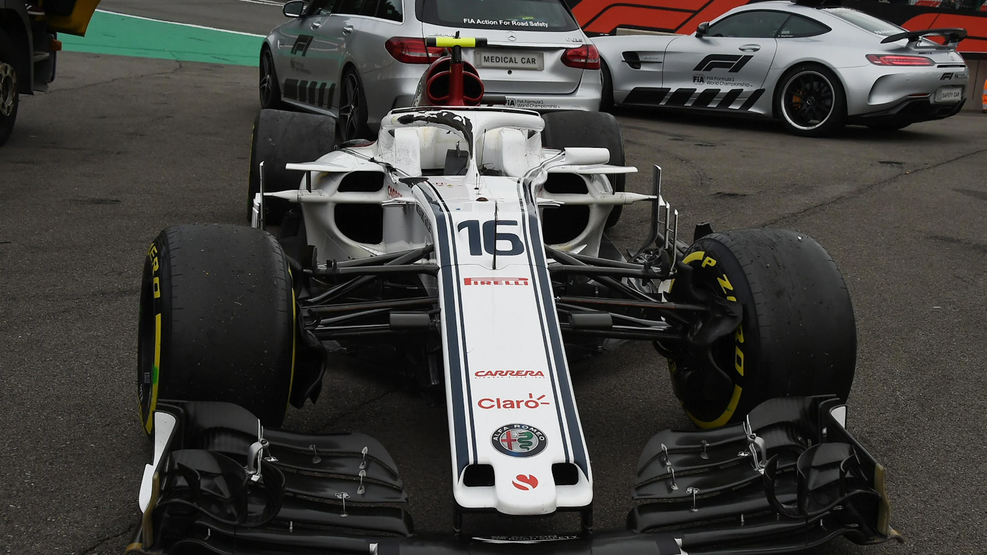 The crashed car of race retiree Charles Leclerc, Alfa Romeo Sauber C37 with damaged halo at Formula